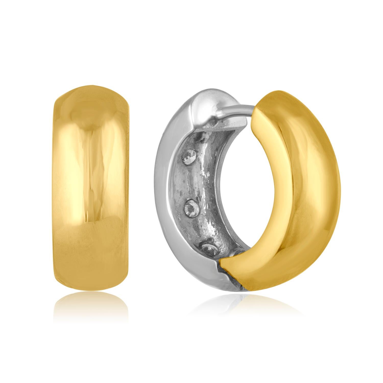Very Fun Two Tone Earrings.
The earrings are 14K White & Yellow Gold
There are 0.50 Carats in Diamonds F SI
The earrings are 0.25