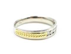 0.50 Carat Diamond Platinum and 18 Karat Yellow Gold Band