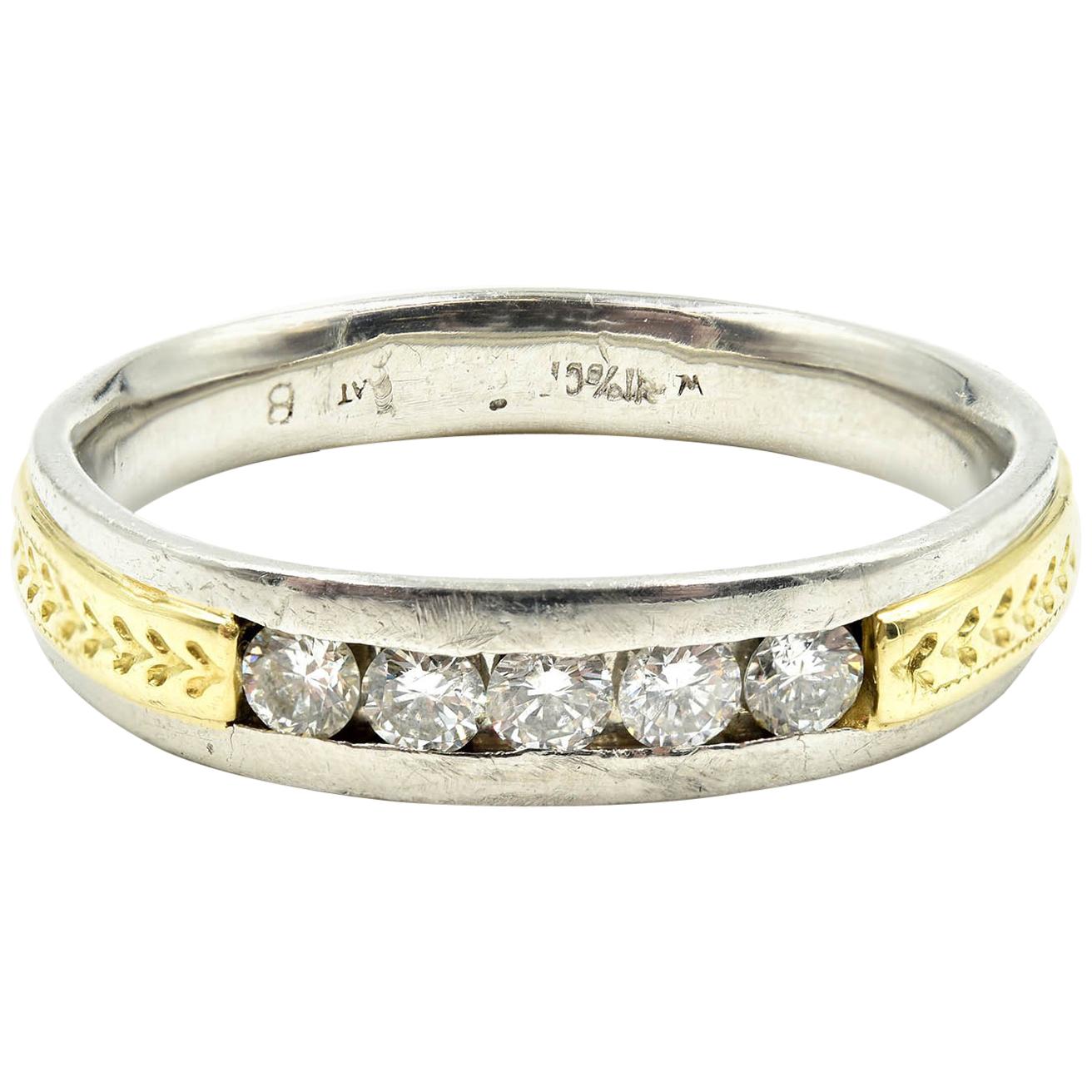 Sortija de Platino y Oro Amarillo de 18 Kilates con Diamantes de 0,50 Quilates