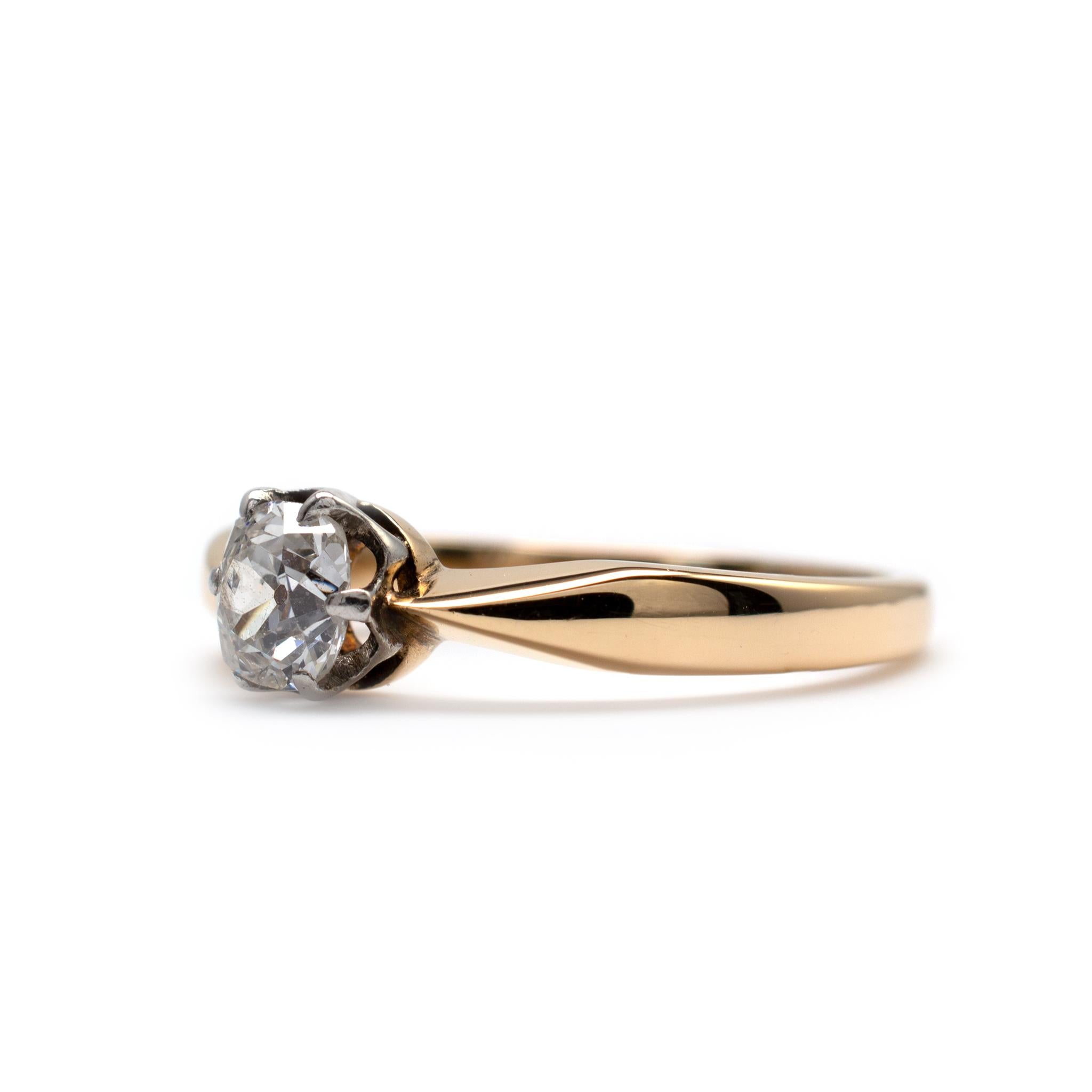 A quality diamond solitaire ring with old cushion cut 0.50-carat diamond, crafted in 18ct yellow gold.

The thick shank has beveled edges with pinched reverse tapered shoulders. The diamond is neatly secured into a decorative rex style setting. A