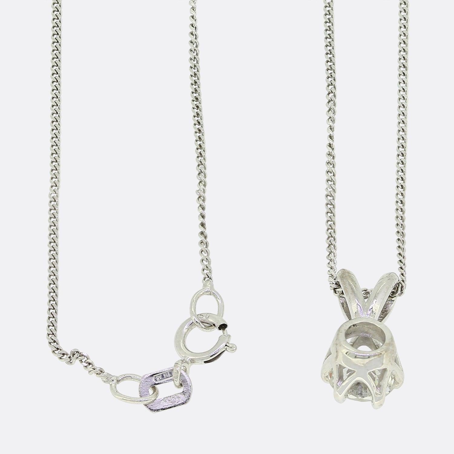 This is an 18ct white gold diamond solitaire pendant. The pendant consists of one round brilliant cut diamond which has been claw set in an 18ct white gold setting with an 18ct white gold chain.

Condition: Used (Very Good)
Total Weight: 2.0