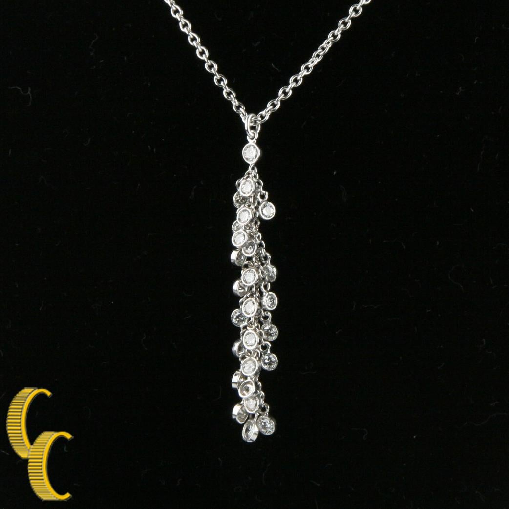 Gorgeous, Unique 18k White Gold Chain Necklace
Features 18k White Gold Diamond Tassle Pendant
Features Individual Round Brilliant Bezel-Set Diamonds Hanging from Chain
Total Diamond Weight = .50 ct
Includes 13