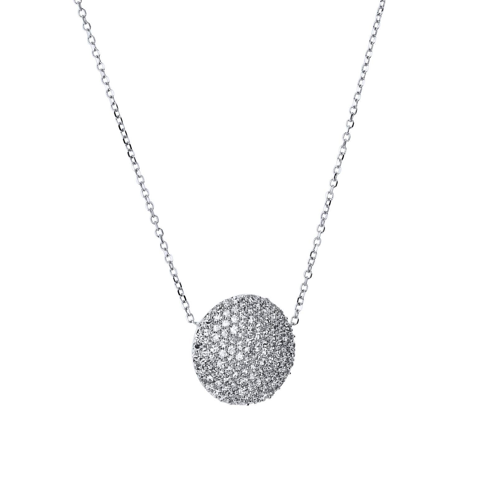 0.50 carat of pave-set diamond adorn a 14 karat white gold round disc in this pendant necklace.
