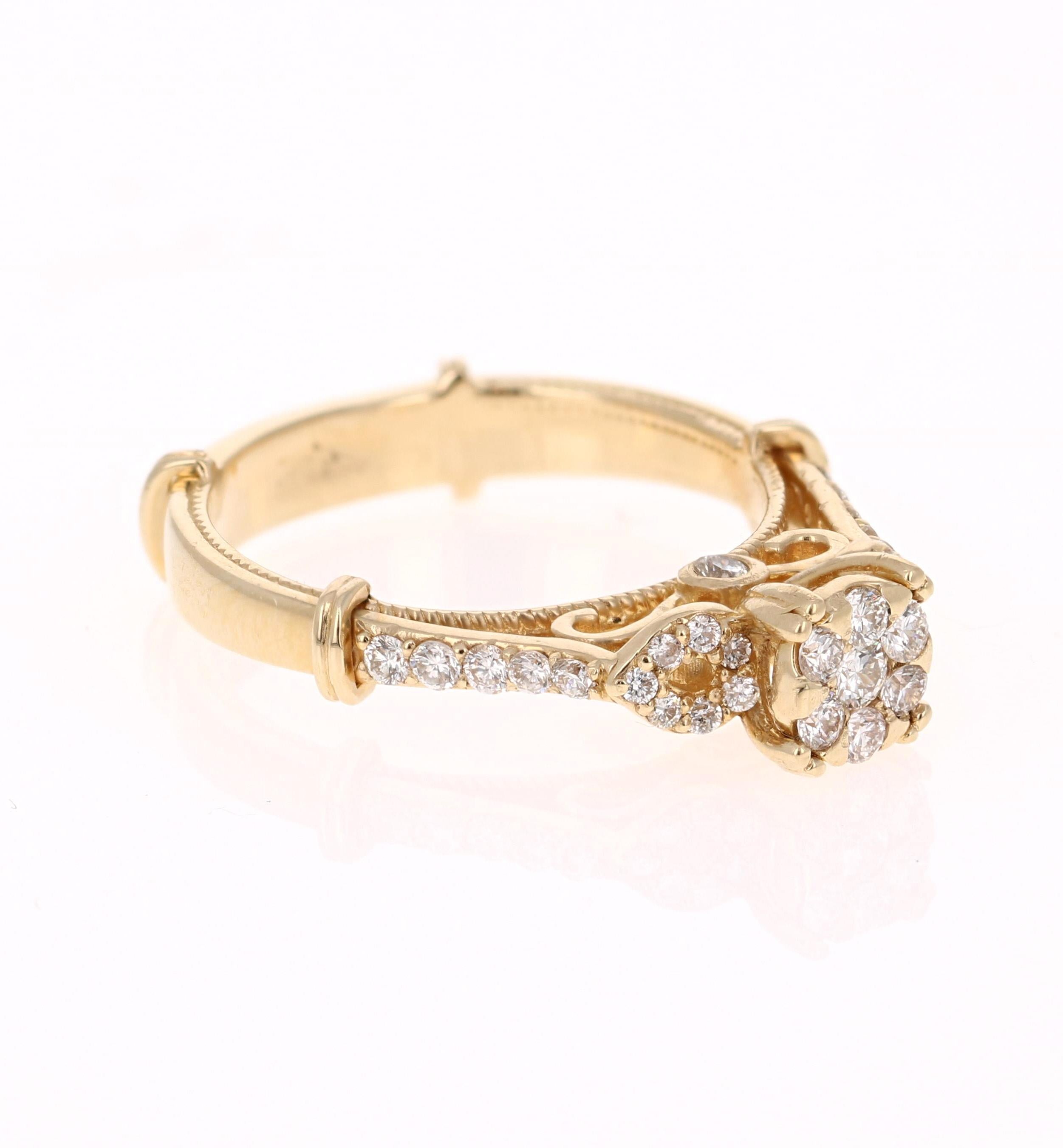 This unique ring has 66 Round Cut Diamonds that weigh 0.50 Carats. The Clarity and Color of the Diamonds are SI1-F.

It is beautifully set in 14 Karat Yellow Gold and weighs approximately 4.3 grams. The center cluster is approximately 5.5 mm. 

The