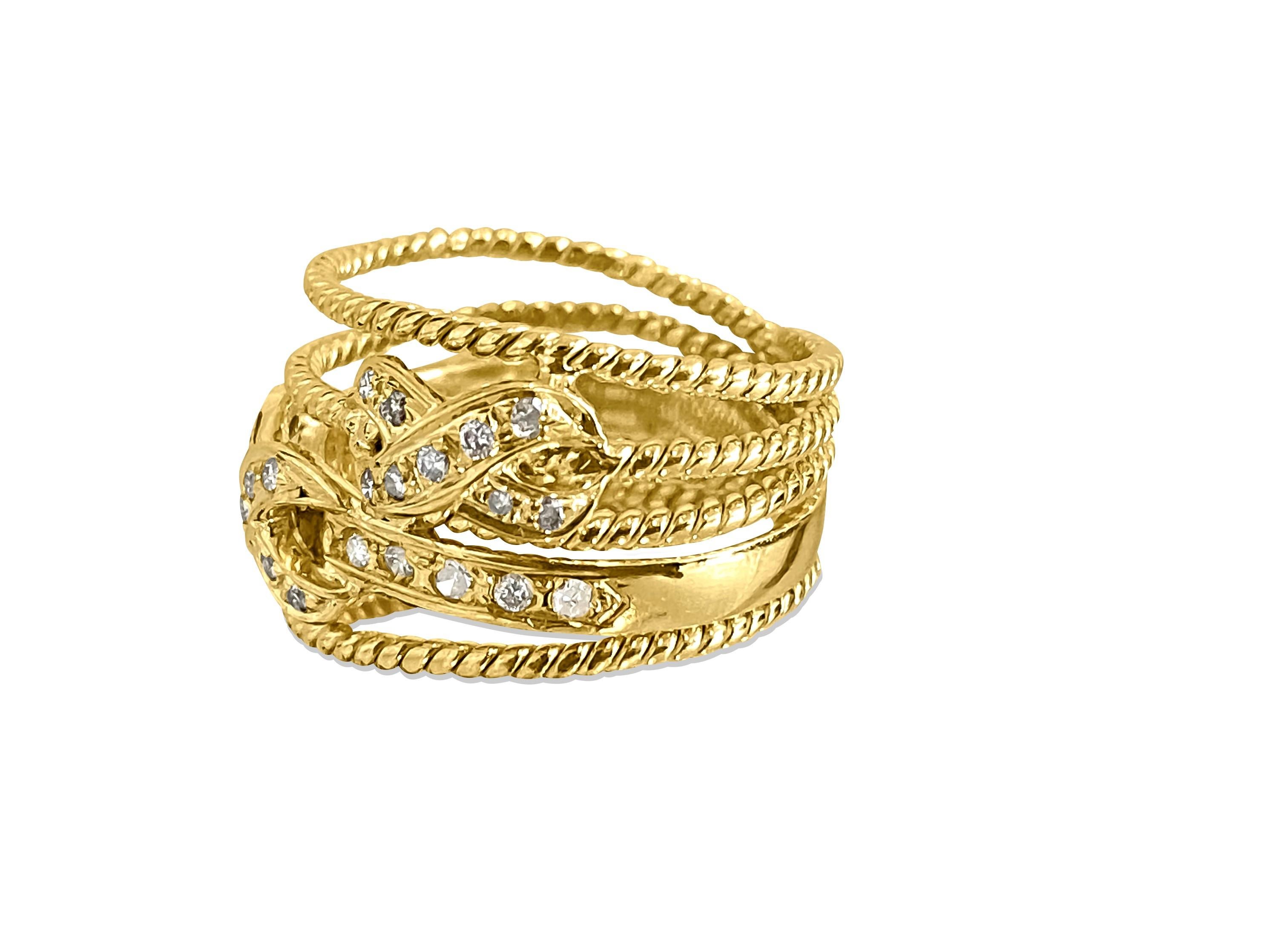 Fashioned from 18K yellow gold, this exquisite ring features a total of 0.50 carats of round brilliant cut diamonds, each boasting VS-SI clarity and G color. Crafted with precision, the double cross motif adds a touch of elegance to the design. With