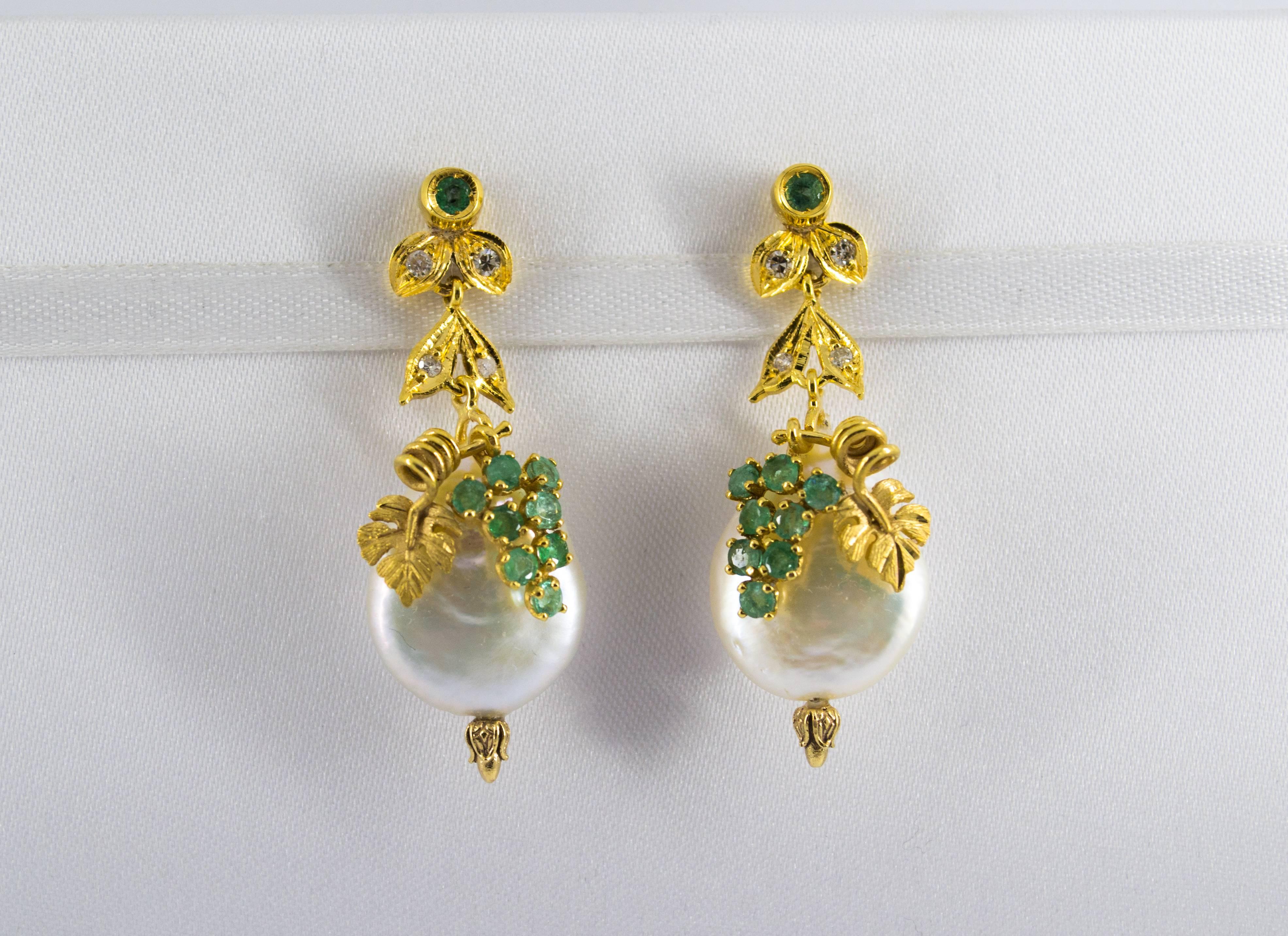 These Earrings are made of 14K Yellow Gold.
These Earrings have 0.16 Carats of Diamonds.
These Earrings have 0.50 Carats of Emeralds.
These Earrings have also Pearls.
We're a workshop so every piece is handmade, customizable and resizable.