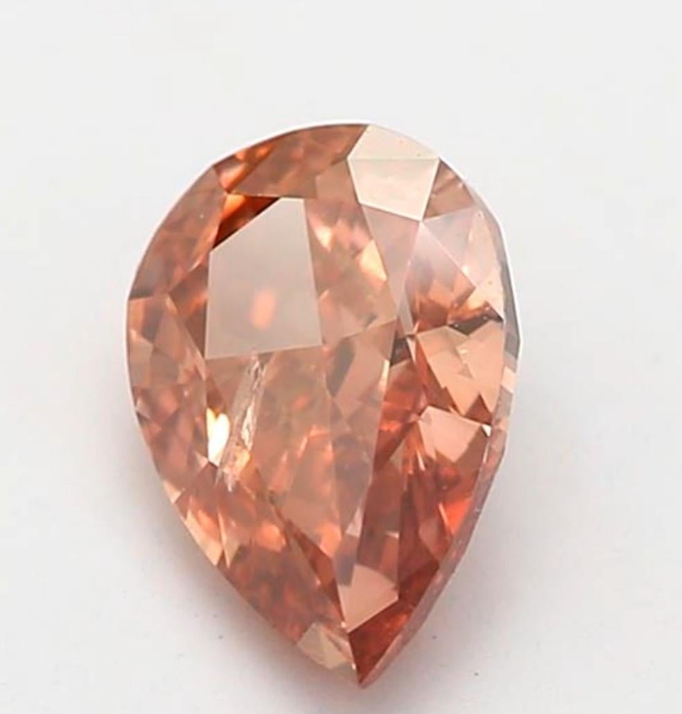 Women's or Men's 0.50 Carat Fancy Deep Brown Pink Pear Cut Diamond I1 Clarity GIA Certified For Sale