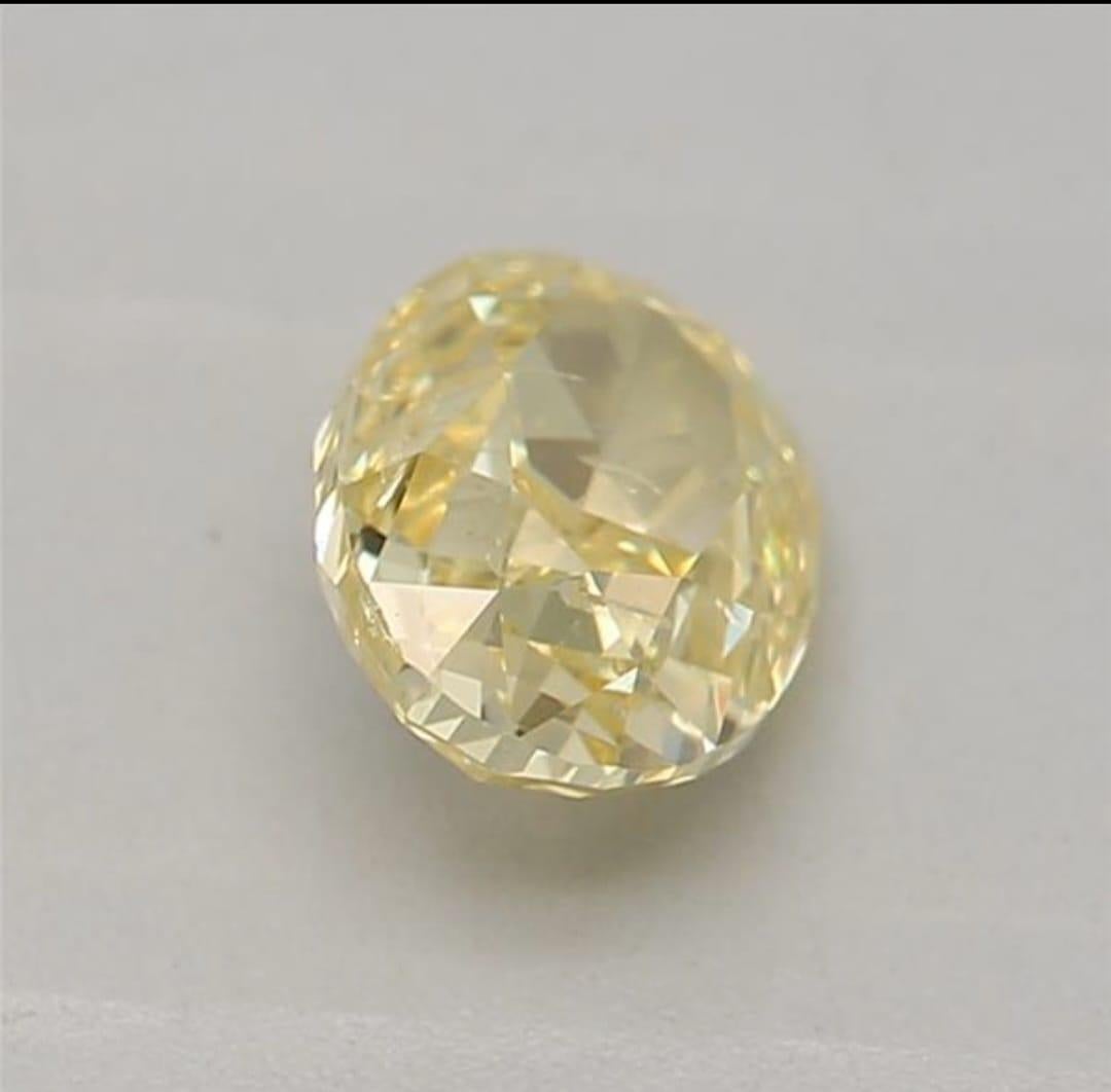 Oval Cut 0.50 Carat Fancy Intense Yellow Oval shaped diamond I1 Clarity GIA Certified For Sale