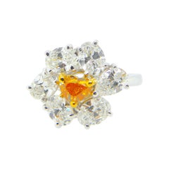 0.50 Carat GIA Certified Fancy Vivid Yellowish Orange Diamond and Diamond Ring