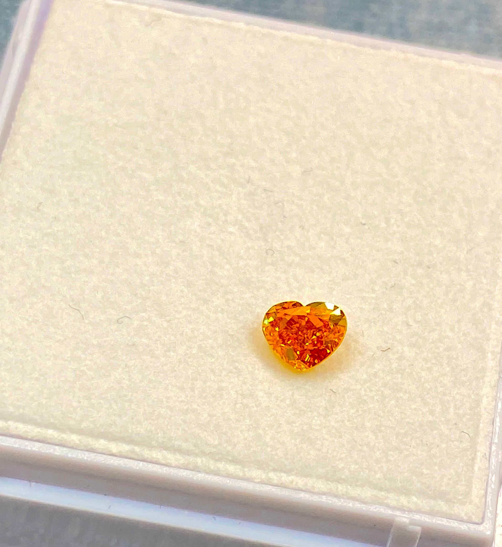 0.50 Carat GIA Certified Fancy Vivid Yellowish Orange Heart-Shaped Diamond 3