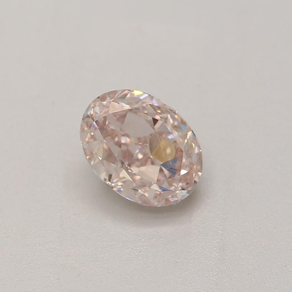 Women's or Men's 0.50 Carat Light Pinkish Brown Oval cut diamond VS2 Clarity GIA Certified For Sale