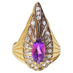 Anillo de amatista marquesa y diamante de 0,50 quilates en oro de 14k