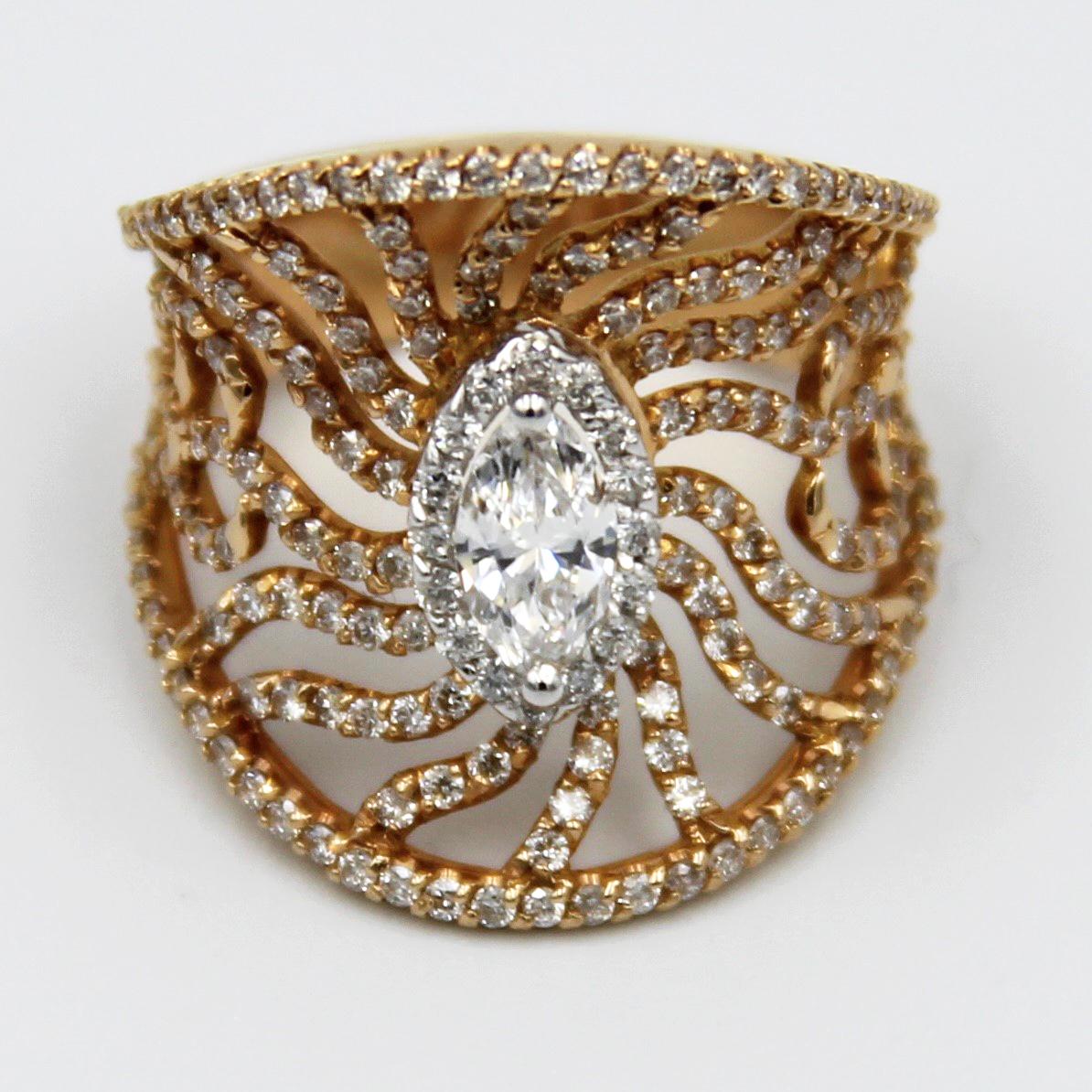 This unique style ring is with 0.50 carat marquise cut diamond and approx. total round brilliant 2.60 carat diamonds .  It is perfectly detailed and defined. Diamond is G-H color and VS clarity . Marked 750 . 18k rose gold .
European