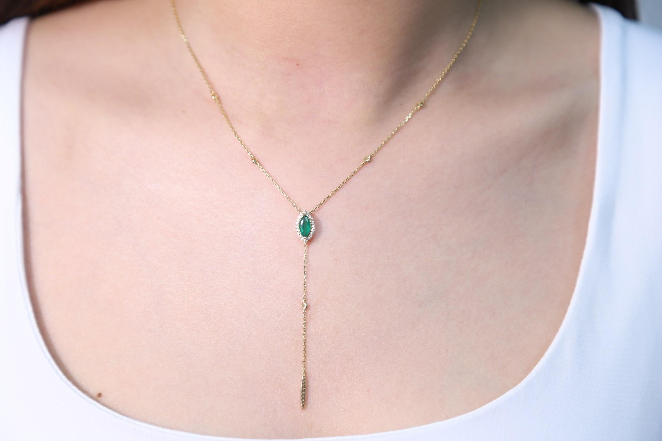 Decorate yourself in elegance with this Pendant is crafted from 14-karat Yellow Gold by Gin & Grace Necklace. This Necklace is made up of 8x4 mm Marquise-Cut Prong setting Emerald (1 Pcs) 0.50 Carat and Round-Cut Prong setting White Diamond (34 Pcs)