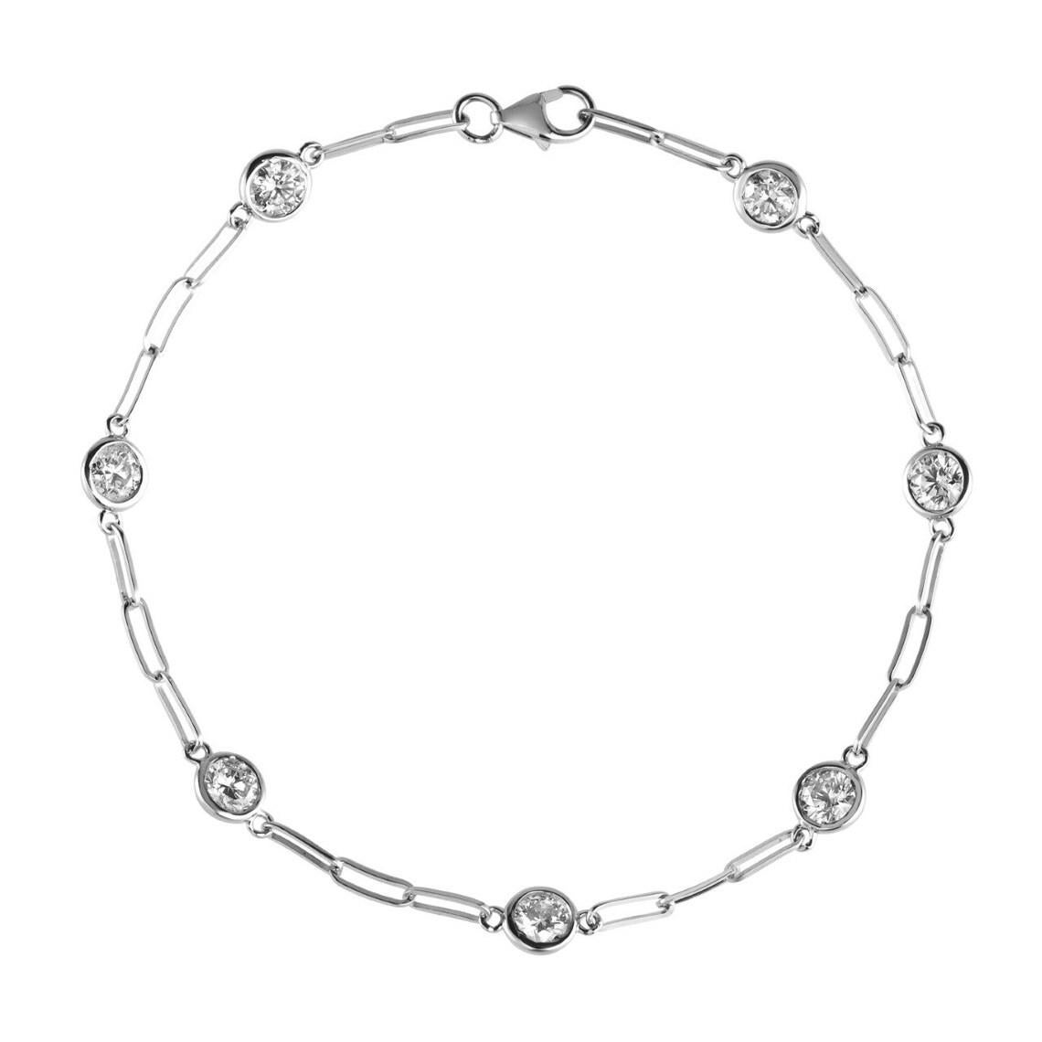 0.52 Carat Natural Diamond Paper Clip Bracelet G SI 14K White Gold 7 inches

100% Natural Diamonds, Not Enhanced in any way
0.52CT
G-H 
SI  
14K White Gold, Bezel set, 1.2 grams
7 inches in length, 1/8 inch in width
7 diamonds, each diamond is