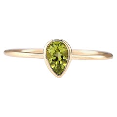 Bague en or jaune 14 carats avec péridot naturel de 0,50 carat