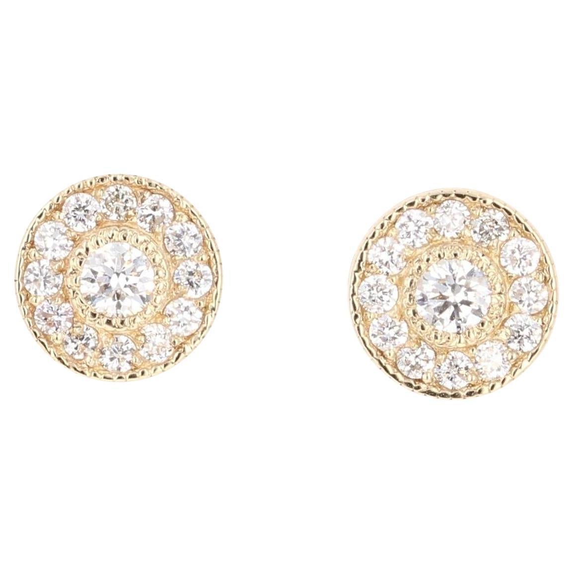Boucles d
oreilles en or jaune avec diamant naturel de 0,50 carat à taille ronde