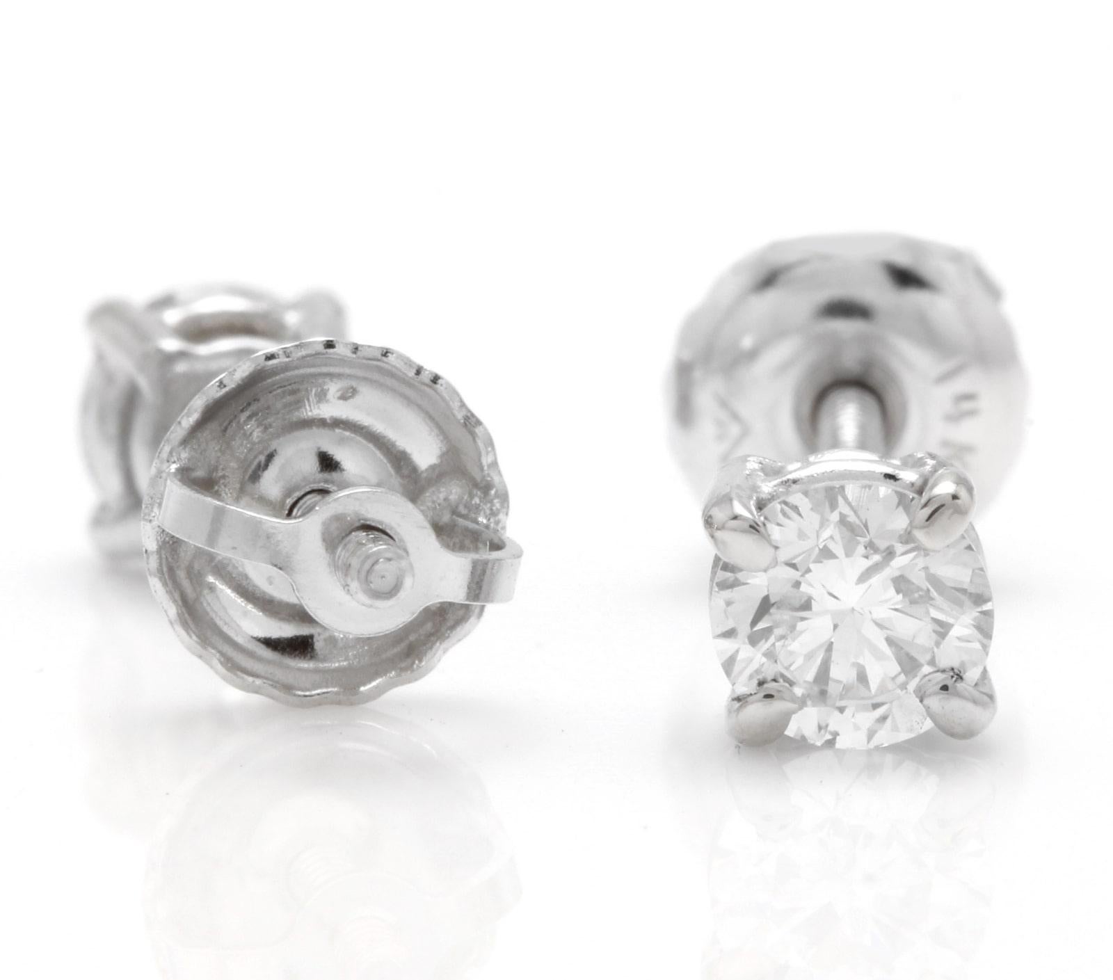 Exquisite 0.50 Carats Natural Diamond 14K Solid White Gold Stud Earrings

Amazing looking piece!

Total Natural Round Cut Diamonds Weight: 0.50 Carats (both earrings) VS2-S1 / G

Diamond Measures: Approx. 4.00mm

Total Earrings Weight is: 1.2