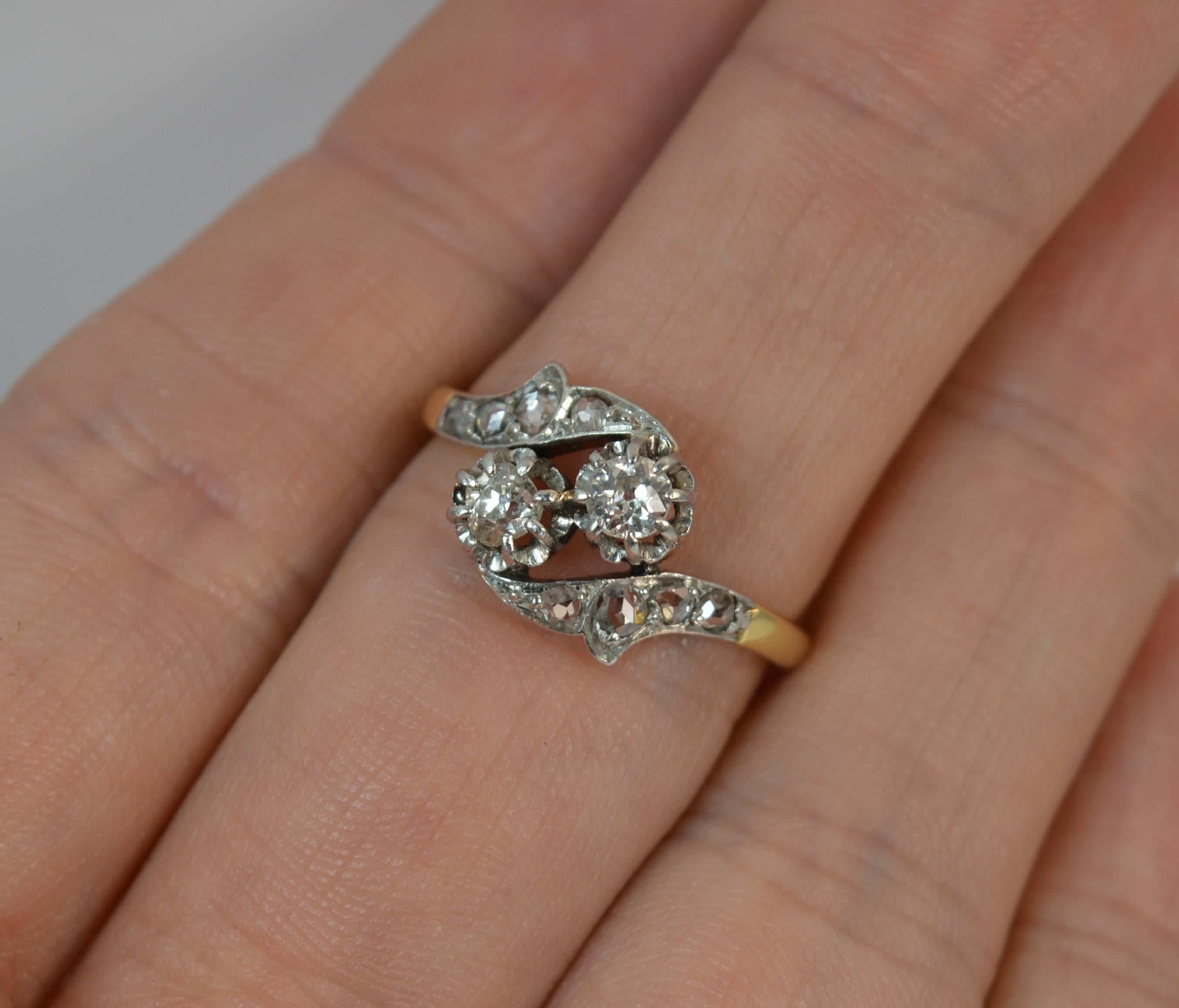 
A superb natural Diamond Toi et Moi ring circa 1890.

​Solid 18 carat yellow gold shank with platinum head and setting.

​Set with two natural old cut diamonds each of 0.20 carat approx in claw settings on a twist with a further four rose cut