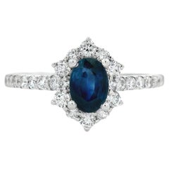 0.50 Carat Oval Blue Sapphire and Diamond Halo Ring in 14K White Gold Size 7