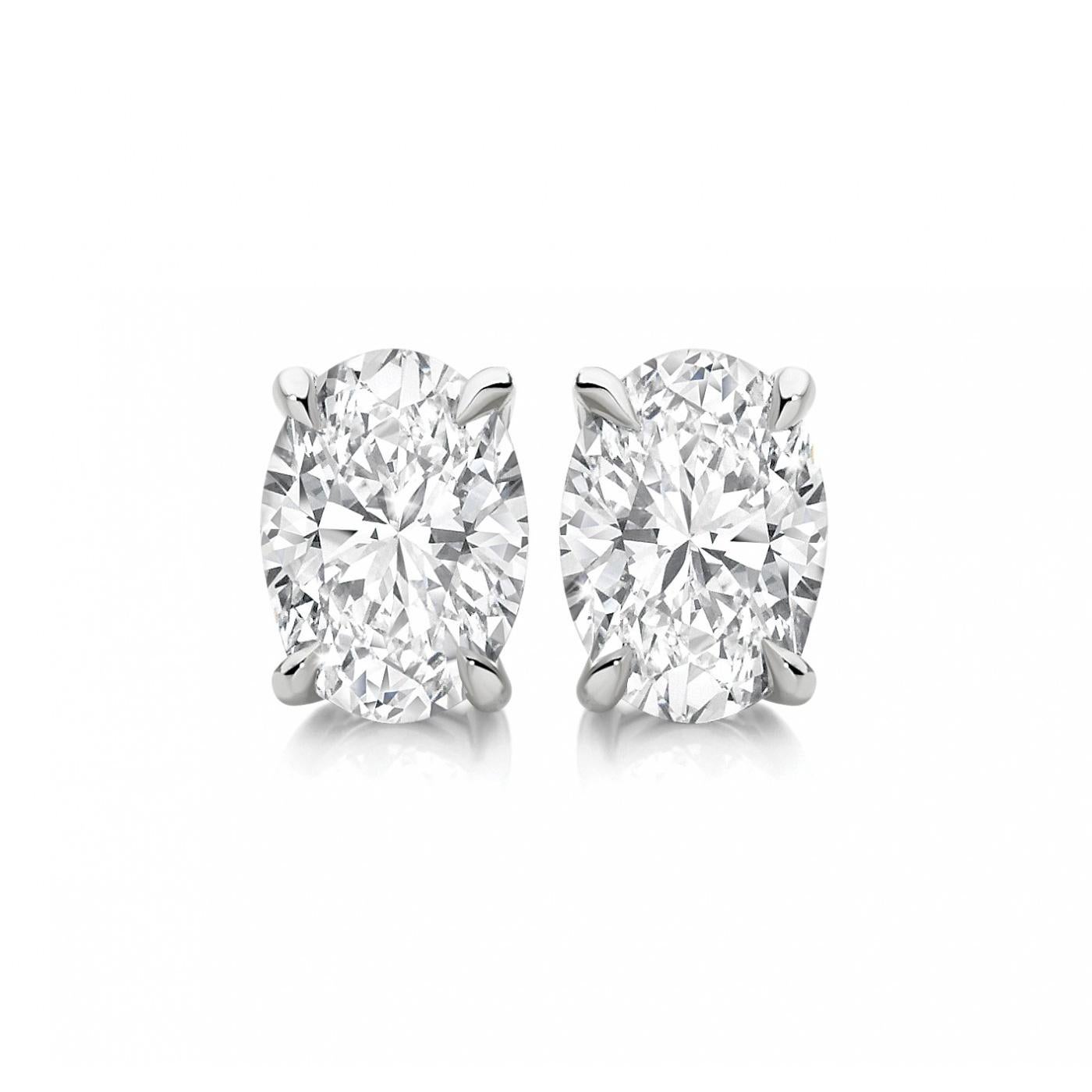 Artist 0.50 Carat Oval Brilliant Cut Diamond Stud Earrings 18 Karat White Gold Setting For Sale