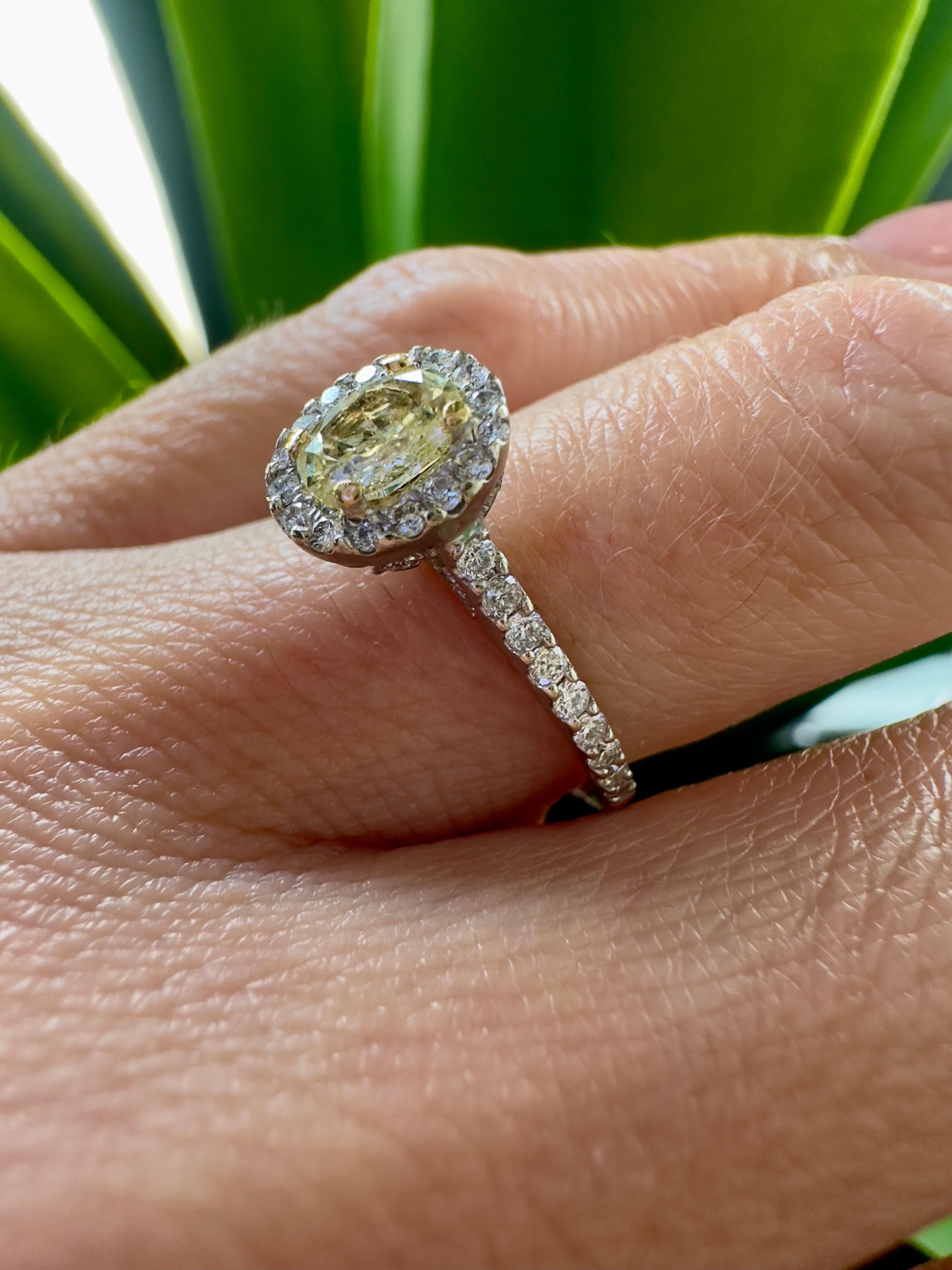 0.50 Carat Oval Cut Yellow Diamond in 18k White Gold Ring For Sale 2