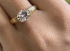 0.50 carat oval Diamond  tapered half bezel Solitaire ring