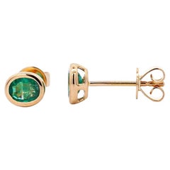 0.50 Carat Oval Emerald Bezel Set 18K Gold Stud Earrings