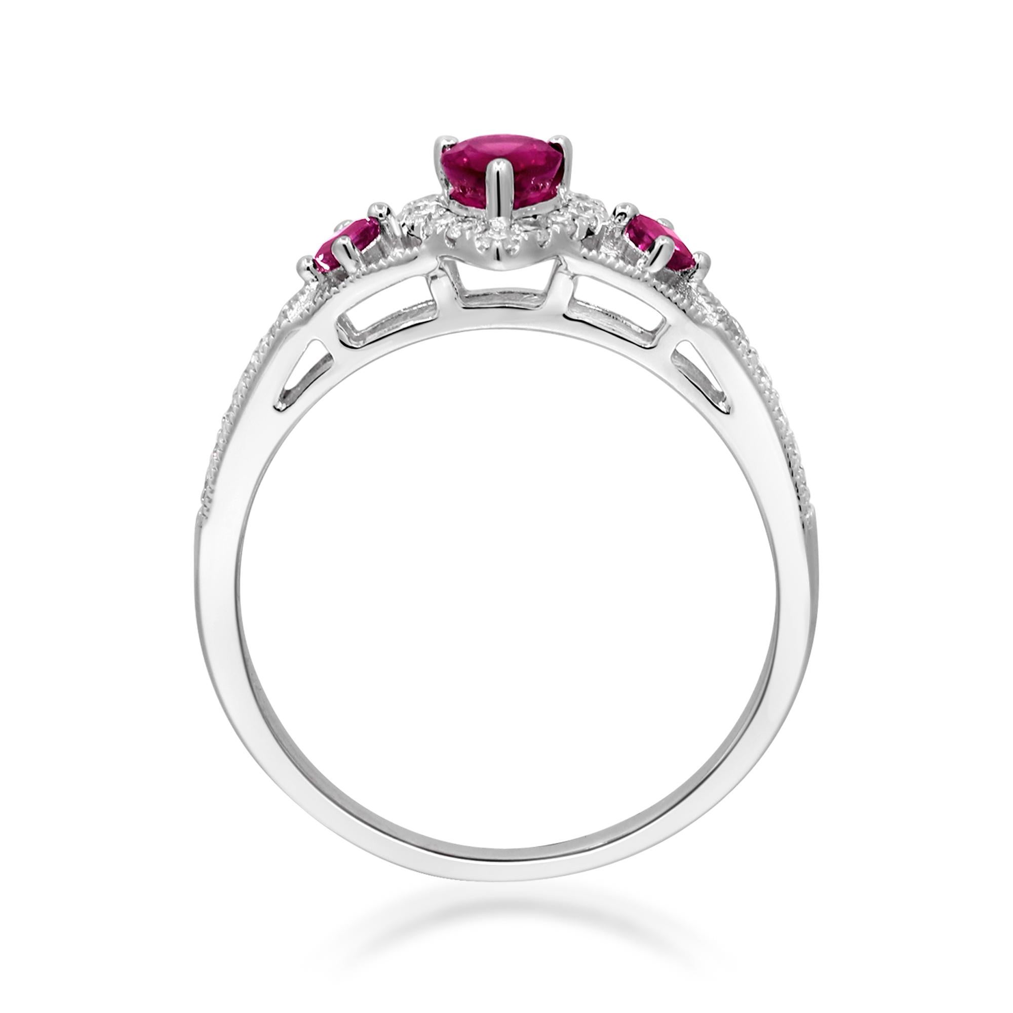 Decorate yourself in elegance with this Ring is crafted from 14-karat White Gold by Gin & Grace. This Ring is made up of 6x4 mm Pear-Cut Ruby (1 pcs) 0.50 carat, 2.0 mm Square-cut Ruby (2 pcs) 0.13 carat and Round-cut White Diamond (24 Pcs) 0.21