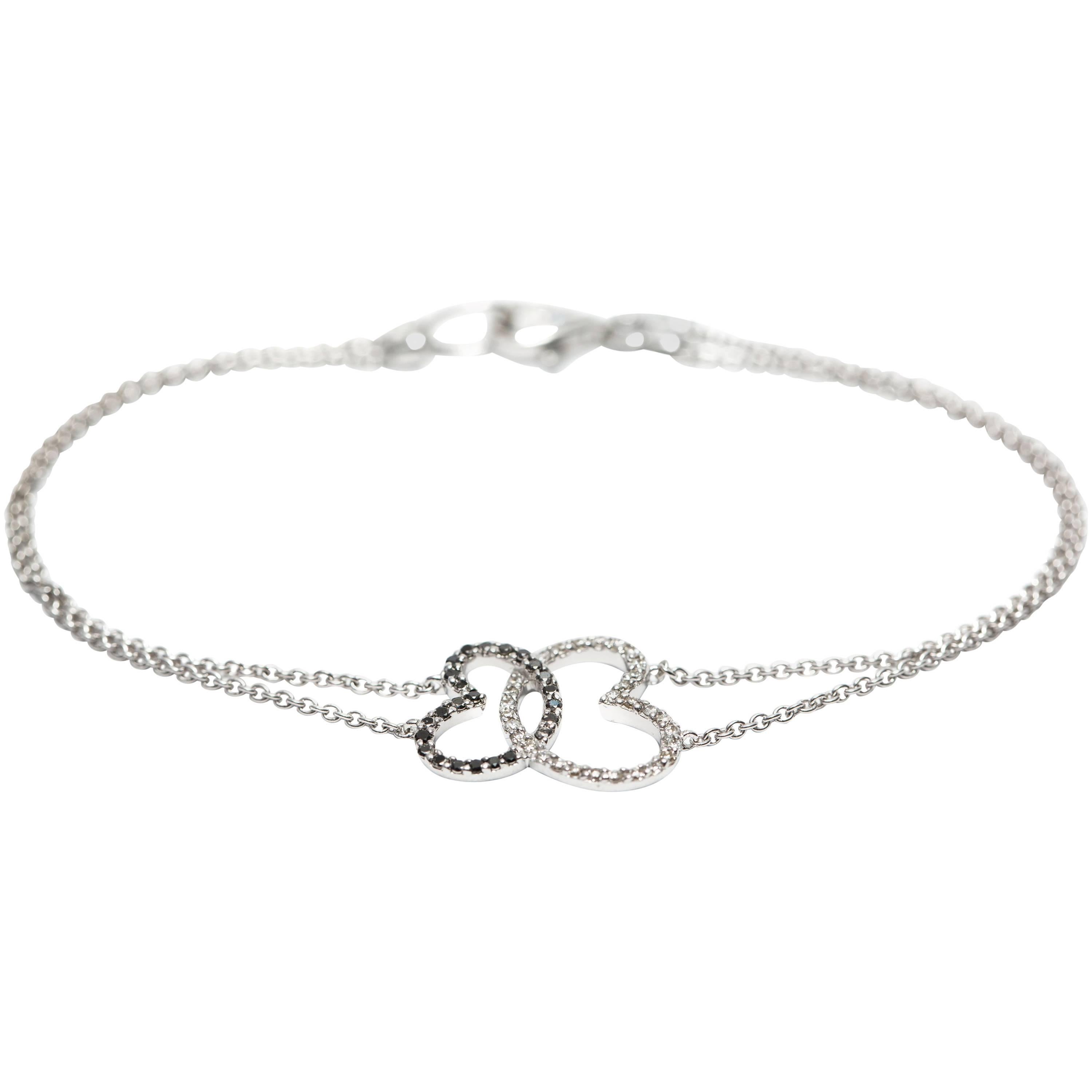 Bracciale in oro bianco 18 carati con diamante nero e brillante rotondo da 0,50 carati