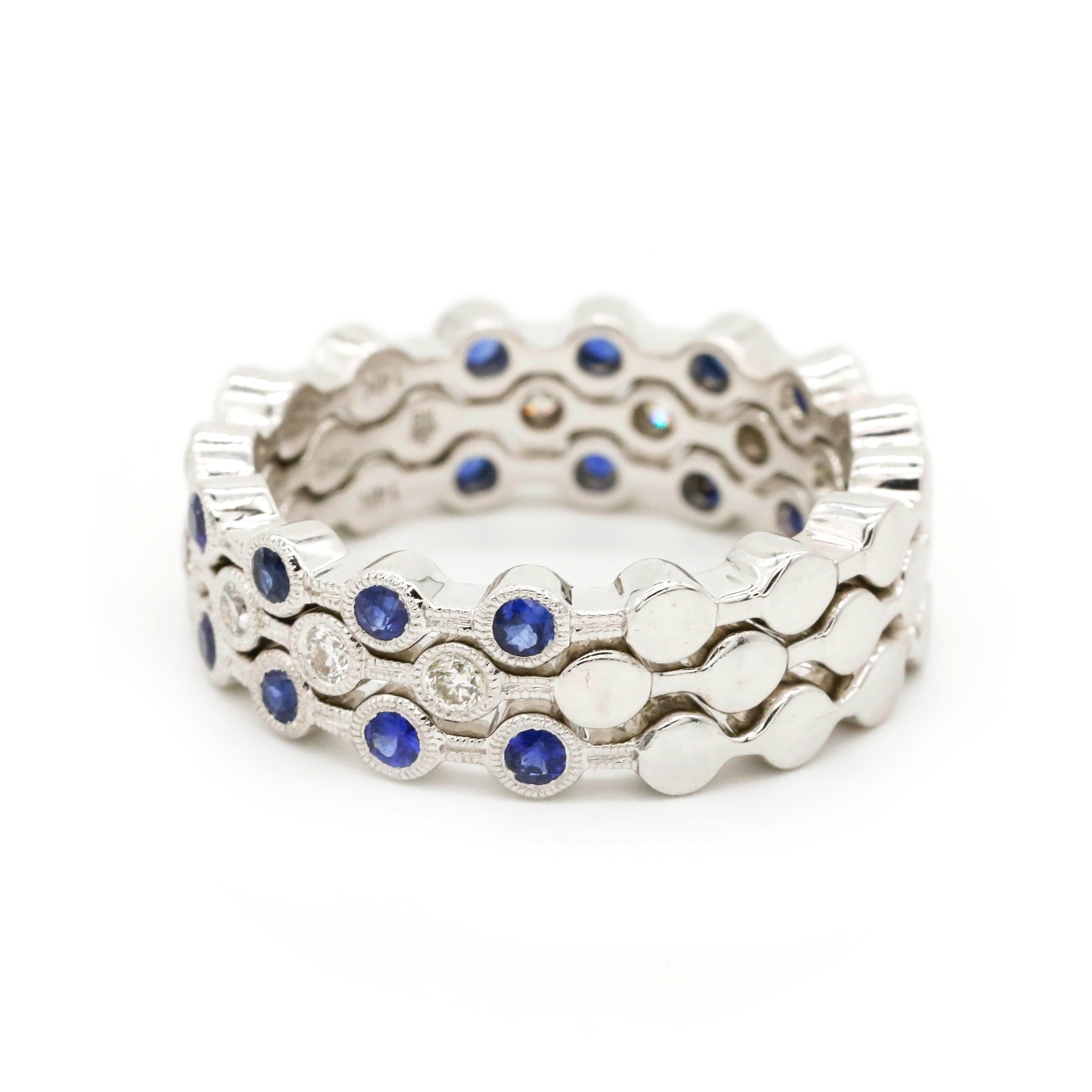 0.50 Carat Round Cut Diamond Blue Sapphire 14k White Gold Eternity Band Ring 

A wedding band or an Anniversary ring - this ring is just perfection. Featuring a single row of 0.68 Carat natural blue sapphire stones , set in a Bezel setting. Buffed