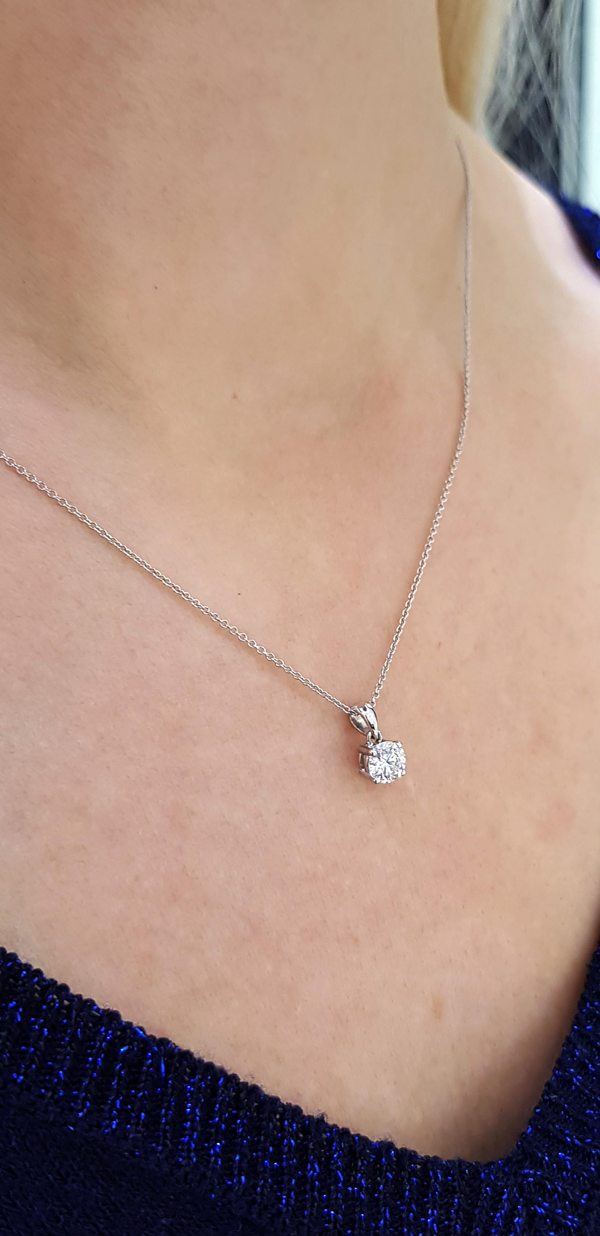 This stunningly 0.50 Carat Round White Diamond on a delicate chain has been designed by Hasbani Diamonds. This elegant and sparkling treasure has been set in 18 Karat White Gold and has been crafted carefully for a truly luxurious feel. Available in