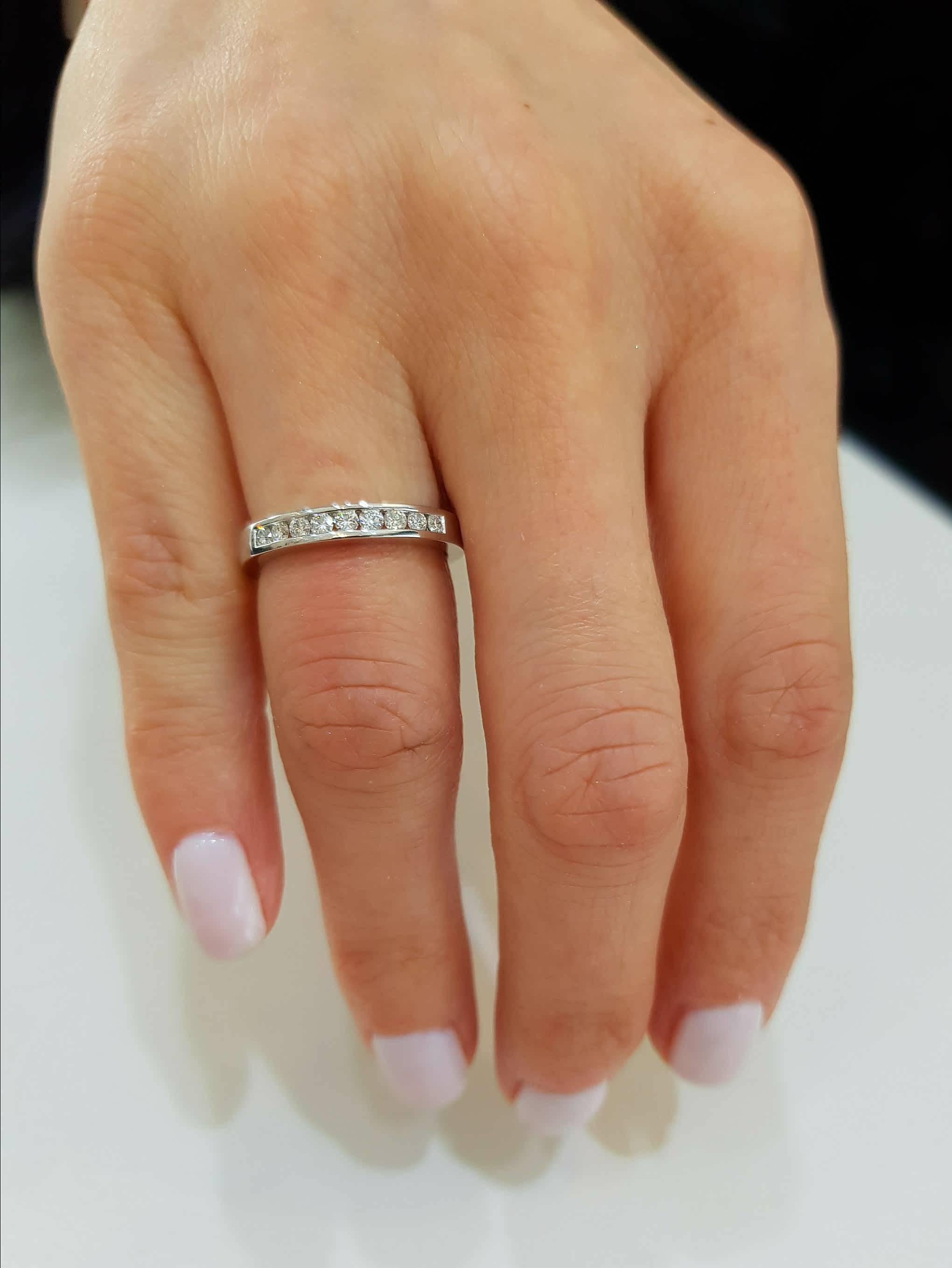 This Channel set 18ct White Gold half Eternity ring is an exquisite addition to our collection. A sparkling array of seven H-SI1 Round Brilliant Diamonds for a classic and iconic look. This ring has a total Diamond weight of 0.50 Carats. The weight