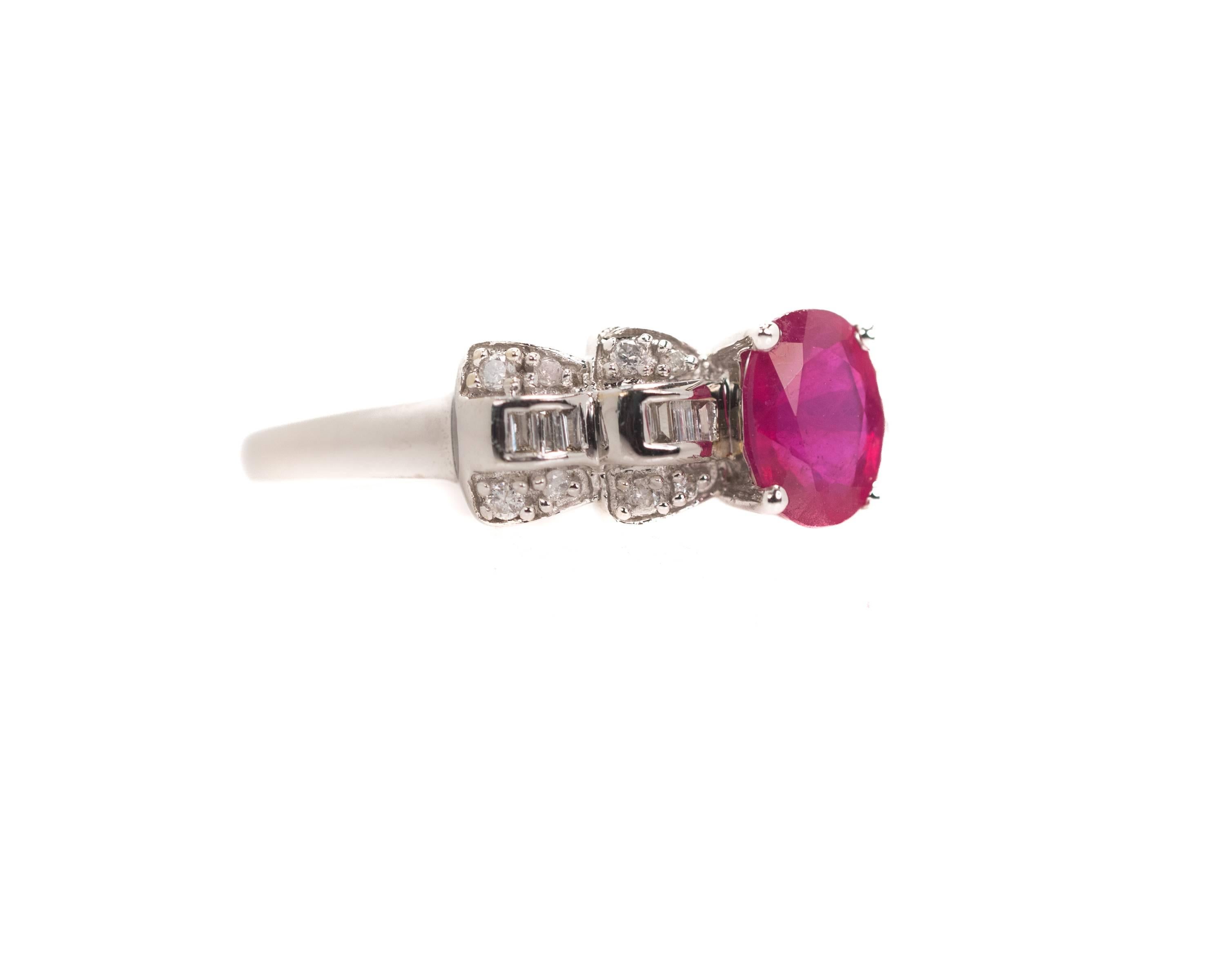1980s Cocktail Ring - 14K White Gold, Ruby, Diamonds

Features a 0.50 Carat Oval cut Red Ruby Center Stone. The oval Ruby is flanked by Baguette Diamonds. Round Brilliant Diamonds are prong set above and below the Baguette Diamonds. The ring shank