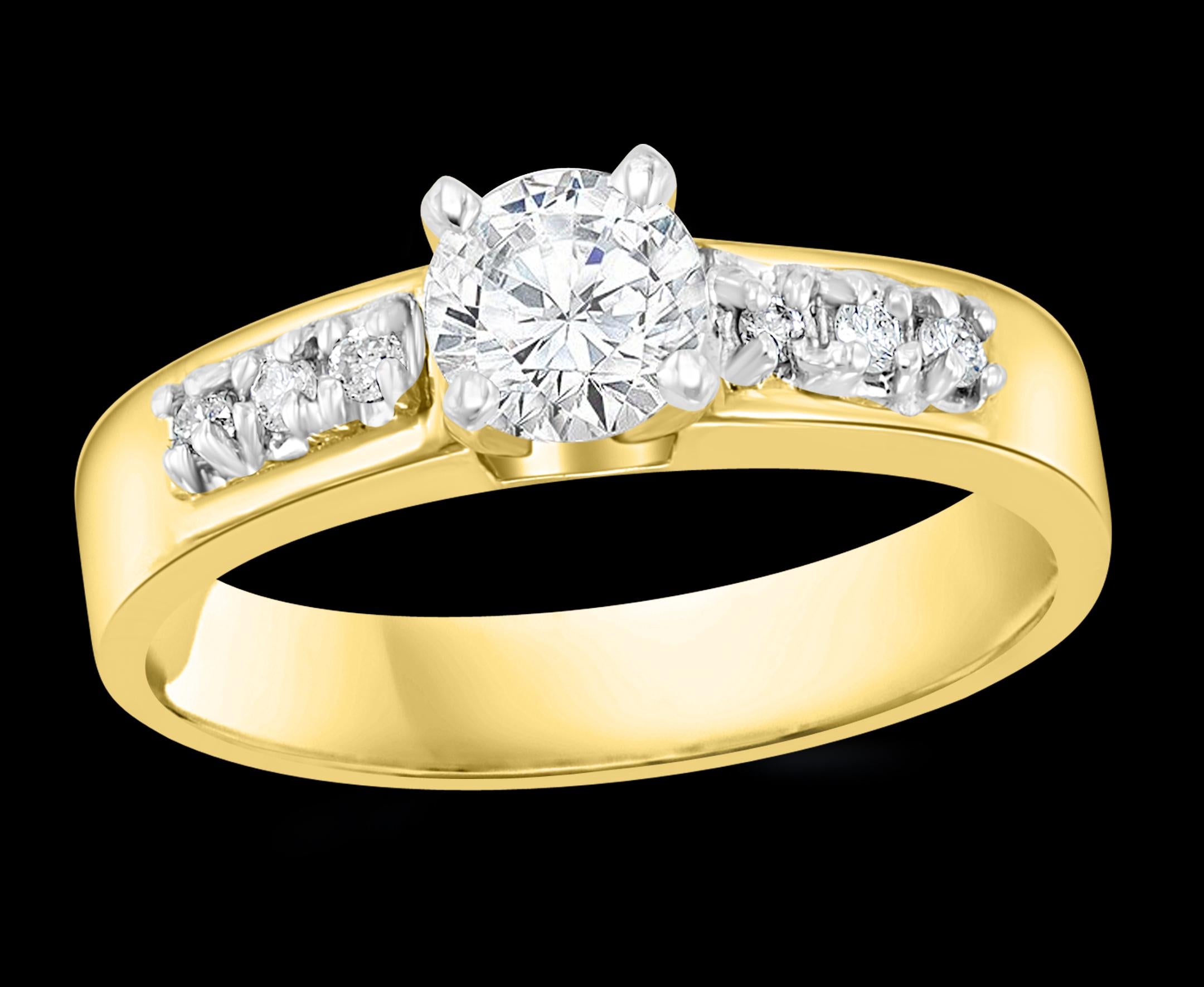 0.50 Carat Solitaire Diamond Traditional Ring/Band 14 Kt Yellow Gold Size 6 

Brilliant cut solitaire round diamond approximately 0.5 ct and 6 brilliant cut diamond, three on each side   next to each other .
Center stone is approximately half carat
