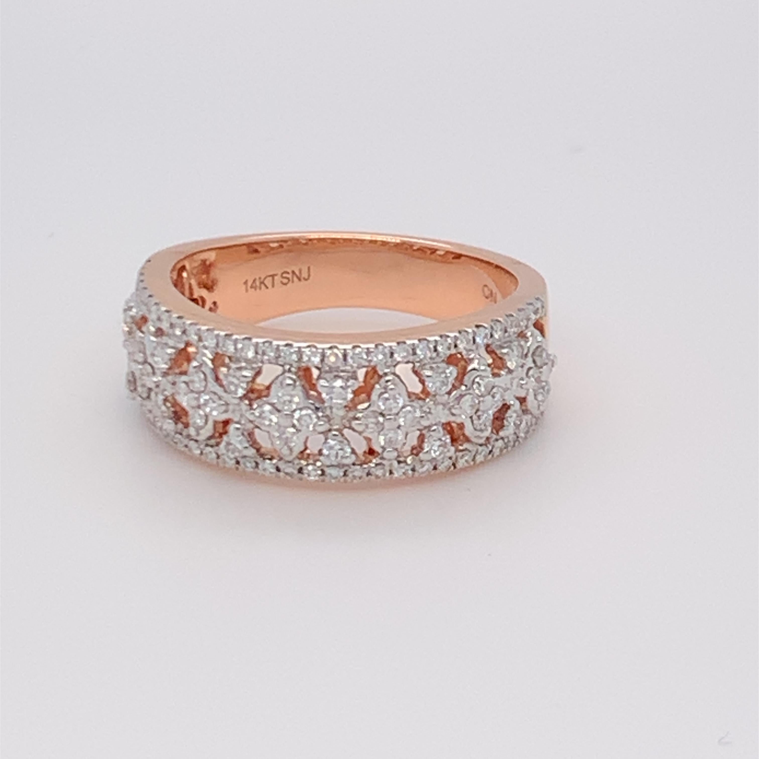 This beautiful white diamond band is carefully finished with hand by skilled craftsmen and mounted in 14K rose gold.  
White Diamond: 0.50ct
Gold: 14K Rose
Size: 7
