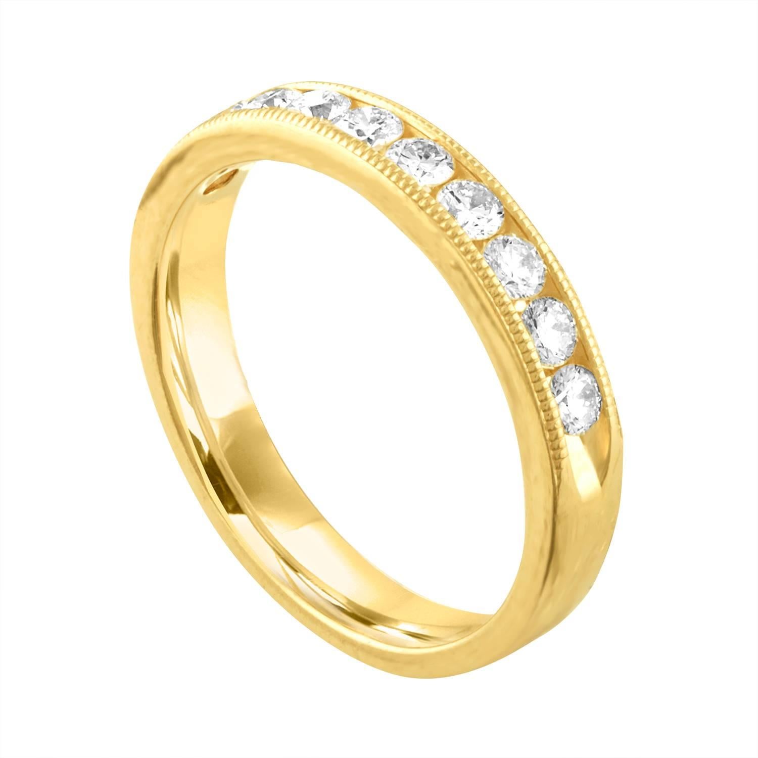 Channel Set Milgrain Half Band Ring
The ring is 14K Yellow Gold.
There are 0.50 Carats In Diamonds F SI
The ring is a size 5.75, sizable.
The ring is 3.25mm wide.
The ring weighs 2.5 grams