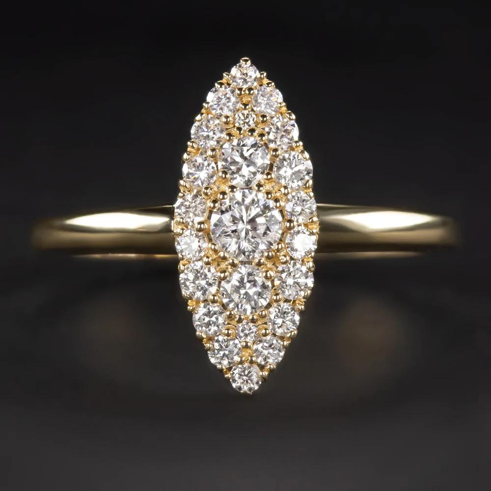 Breathtaking diamond studded cocktail ring is elegantly designed with artistic and elegant navette style. 
The diameter of the ring is 20mm, this charming vintage style ring makes an absolutely stunning impact and offers a dazzling sparkle.
The 14K