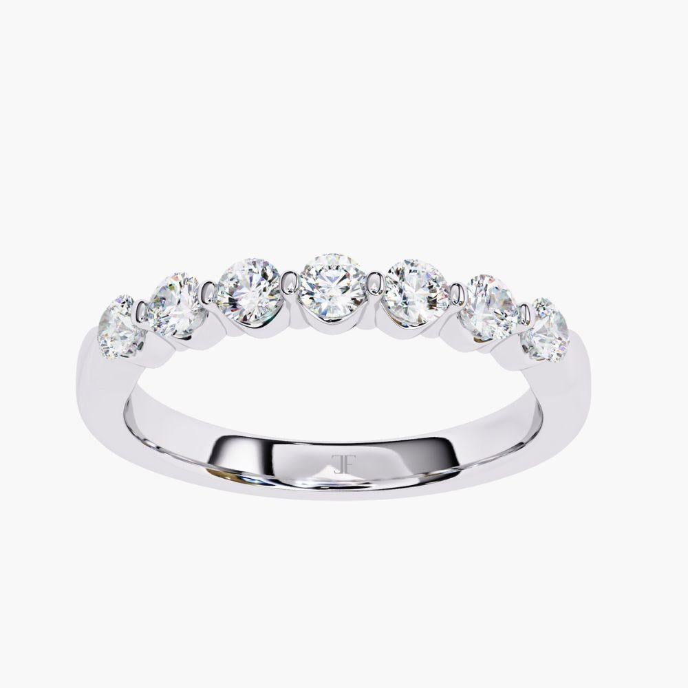 Product Details
Metal Type: 14k Gold
Diamond Type: Natural Diamond
Carat Total Weight (ctw): 0.50 ctw (Ring Size US 6.5)
Total Number of Stones: 7 pcs 
Diamond Cut: Round Cut Brilliant
Size of Stones: 7pts
Band Height: 2.7mm
Diamond Color: Near