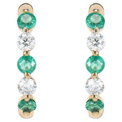 0.502 Carat Emerald Hoop Earrings in 14 Karat Yellow Gold with White Diamond