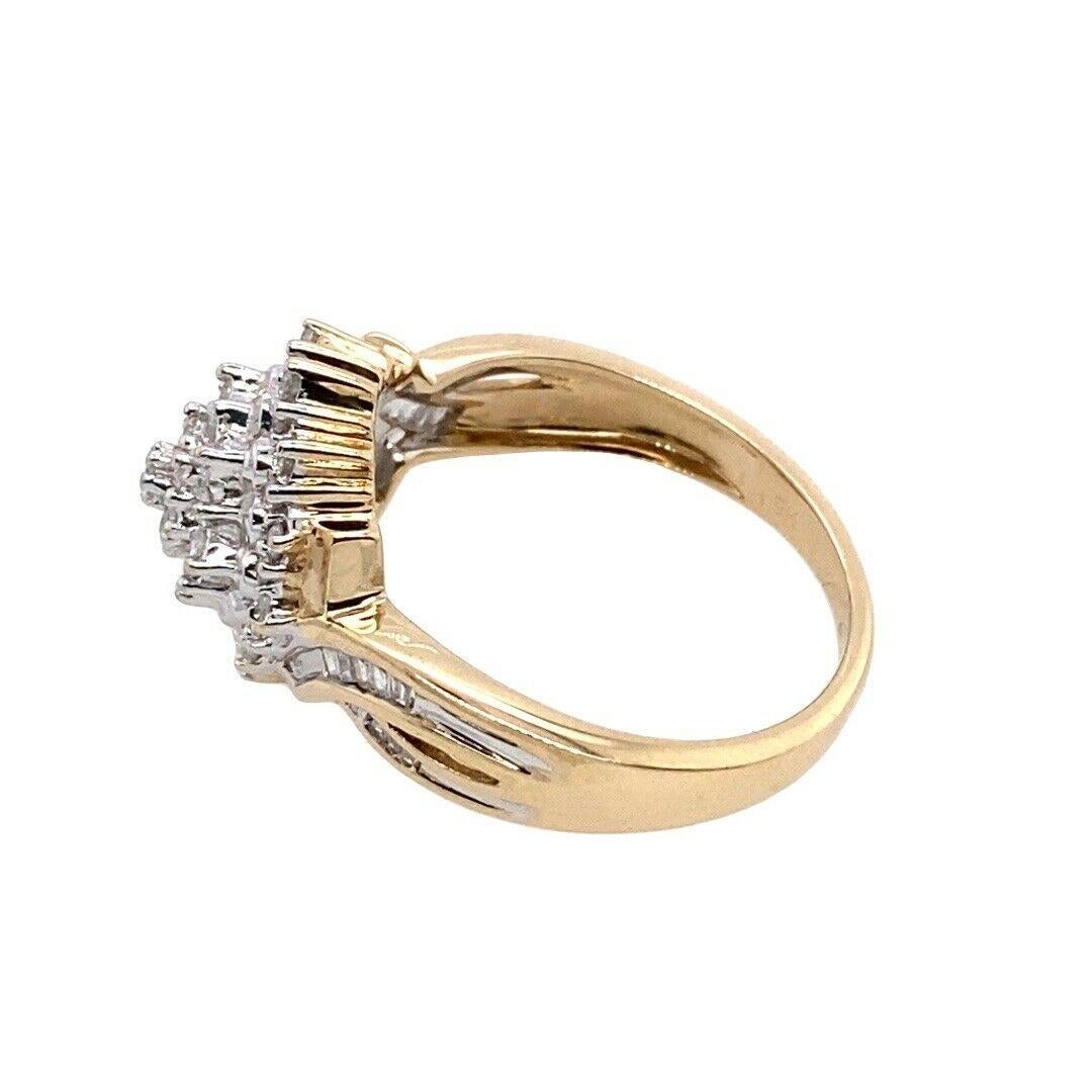 0.50ct Classic Diamond Cluster Ring with Channel Set Shoulders in 9ct Gold In Excellent Condition For Sale In London, GB