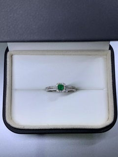 0.50ct Colombian emerald diamond halo engagement ring in 18ct white gold wedding