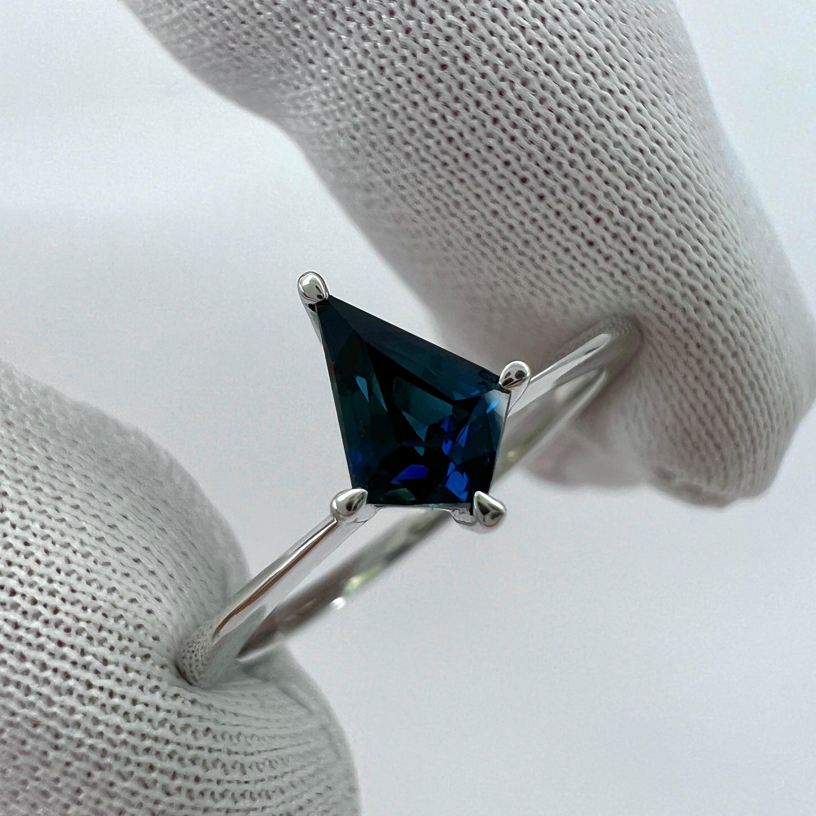 Natural Deep Blue Sapphire Fancy Kite Cut 18k White Gold Modern Solitaire Ring.

0.50 Carat natural sapphire with a unique fancy kite cut and stunning deep blue colour.

Set in a beautiful and modern 'thin' ring. 18k white gold.

Ring size UK N - US