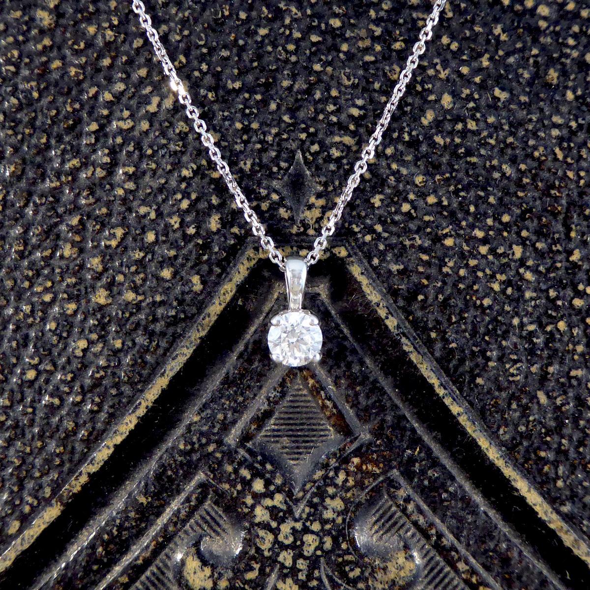 A beautifully sparkly Diamond pendant necklace. Sitting in this pendant is a 0.50ct Diamond in a four claw curtain style open setting allowing lots of light to pass through creating sparkle throughout. It is fully modelled in 18ct White Gold on a