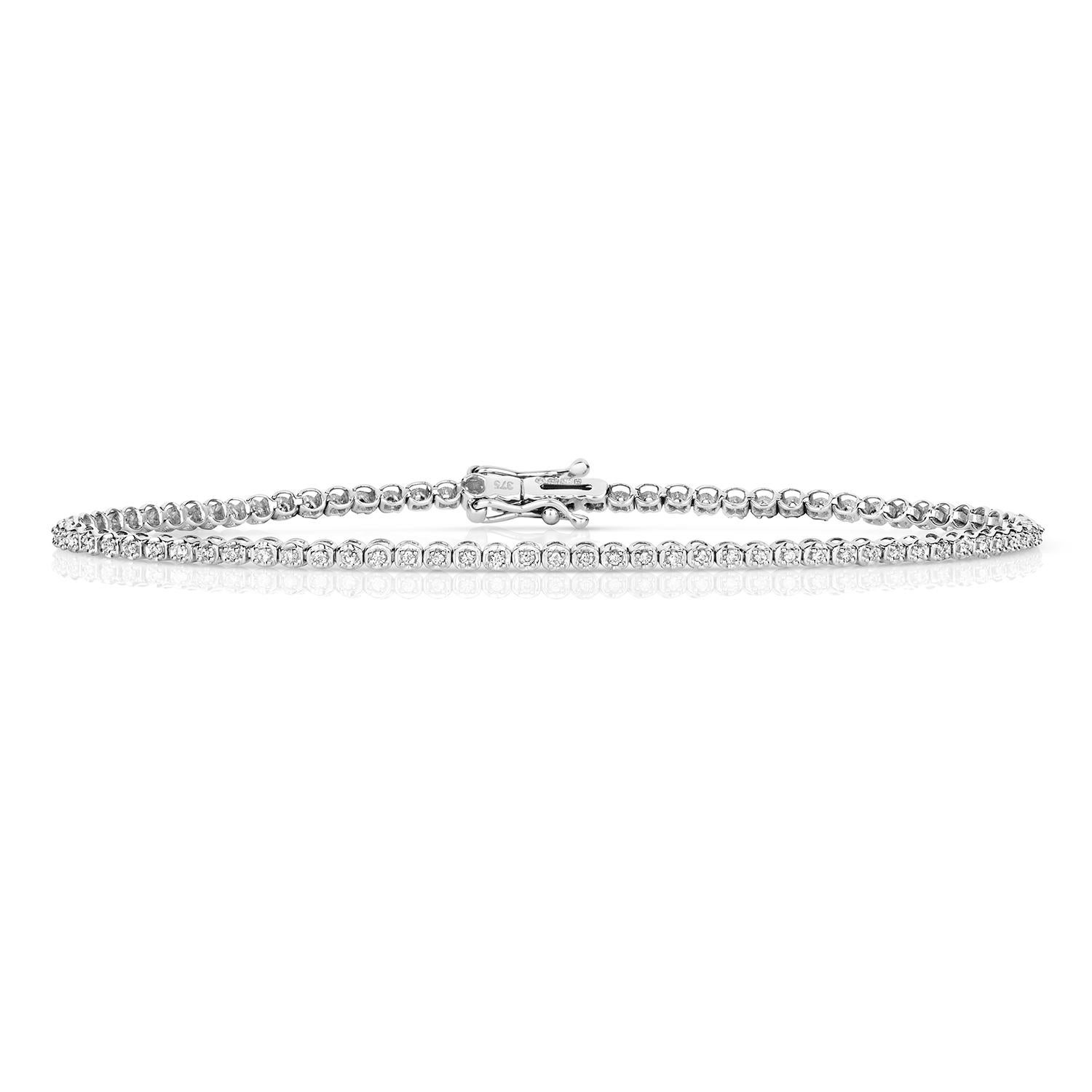 DIAMOND BRACELET

9CT W/G HI I1 0.50CT

Weight: 3.3g

Number Of Stones:85

Total Carates:0.500