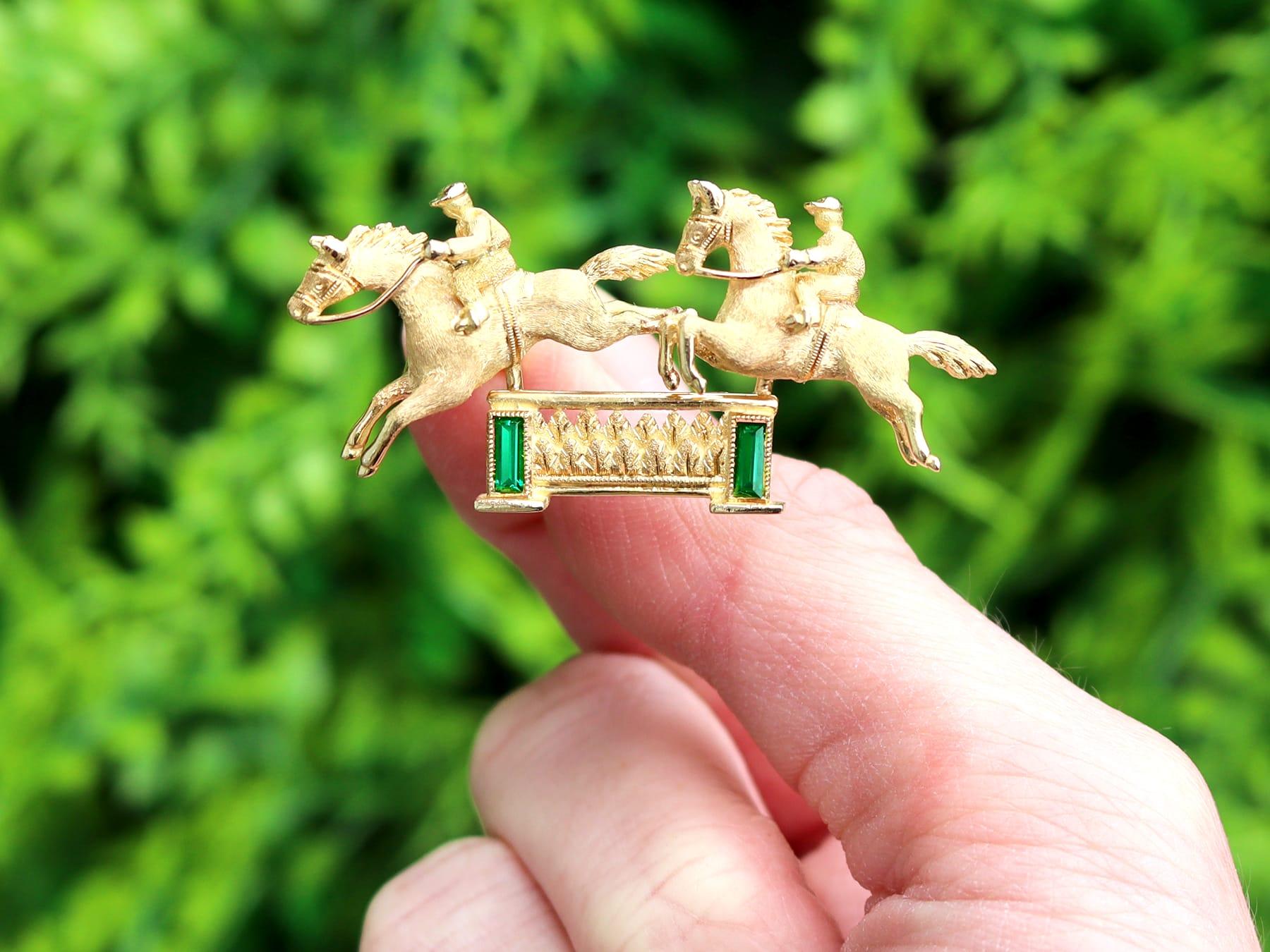 A fine and impressive vintage 0.50 carat green tourmaline and 18 karat yellow gold double horse and jockey brooch; part of our diverse vintage horse jewelry collections.

This fine and impressive vintage brooch has been crafted in 18k yellow