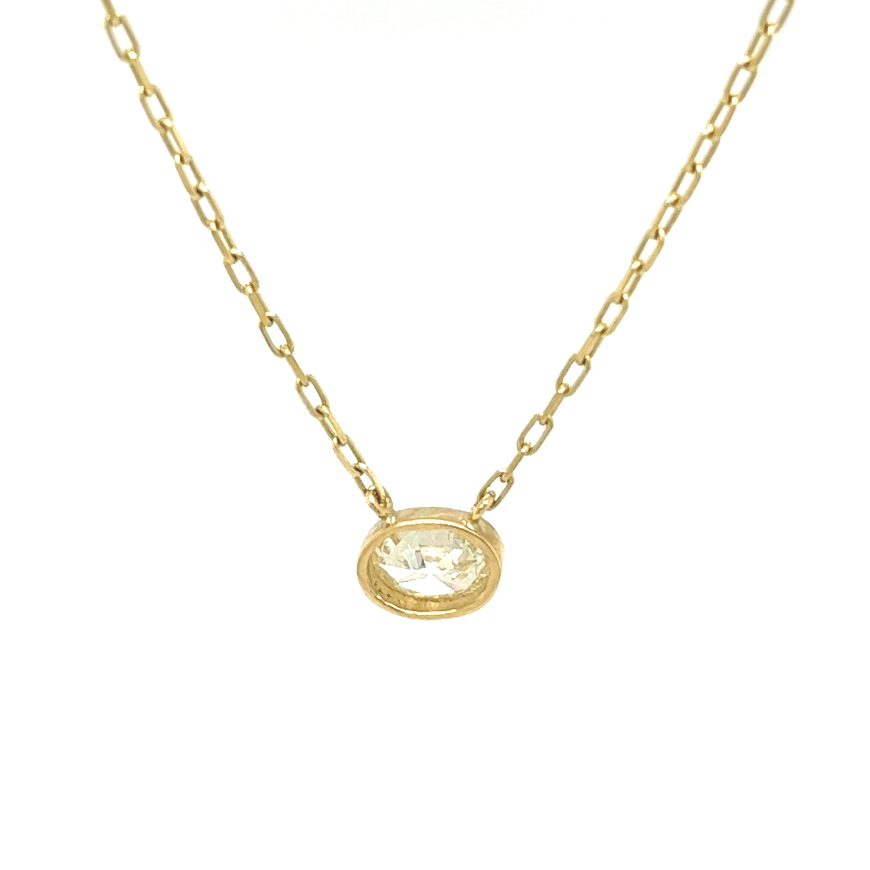 This beautiful Diamond is a natural oval-shaped Diamond that has been set in a 18ct Yellow Gold mount. 

Additional Information:
The chain length is 16