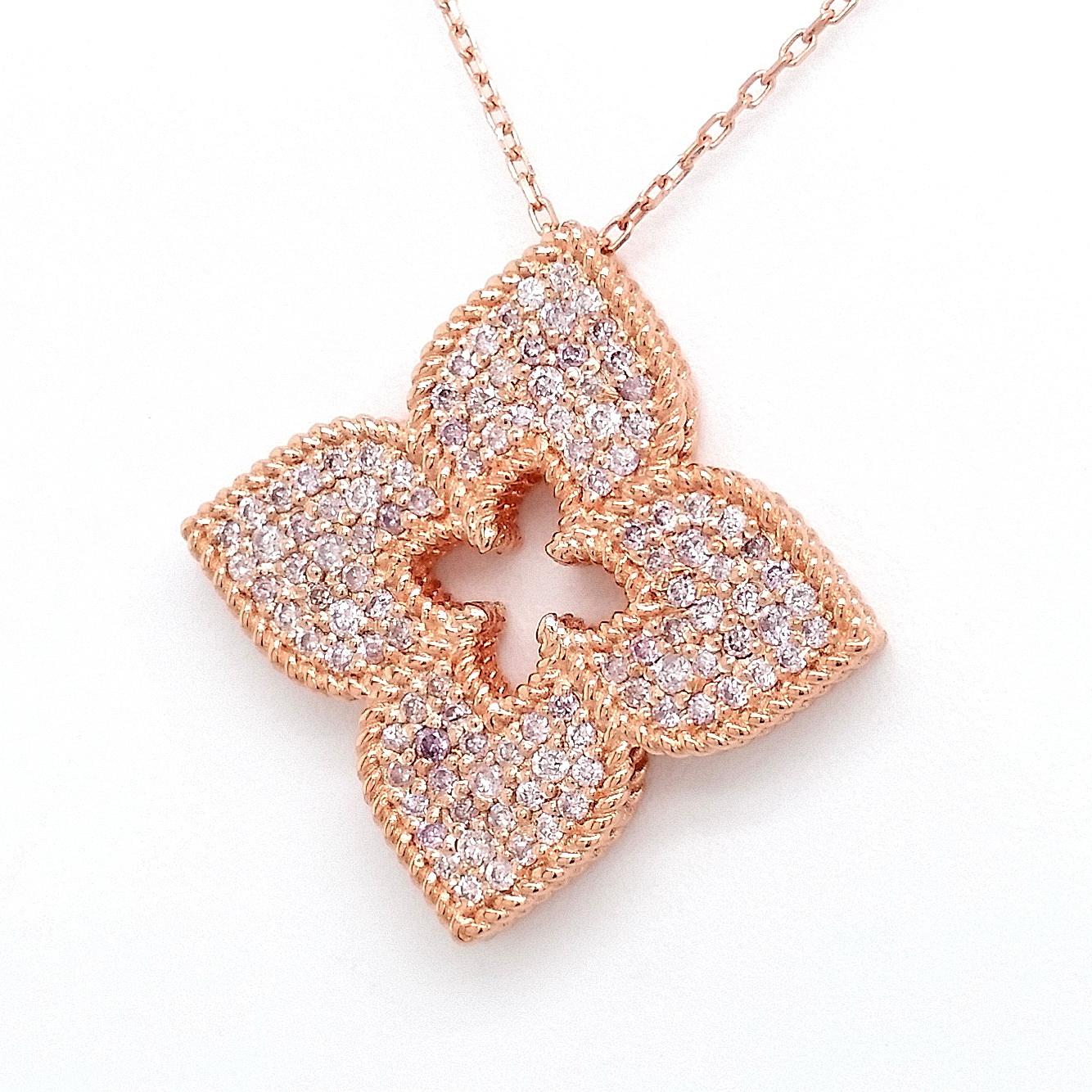 FOR U.S. BUYERS NO VAT 

This breathtaking 14kt pink gold pendant showcases a flower-like design made with 118 round brilliant pink diamonds totaling 0.50ct. 
For more information, please check the attached certificate.

