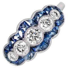 Anello di fidanzamento con diamante rotondo taglio Brilliante da 0.50 carati, zaffiro aureolato, platino