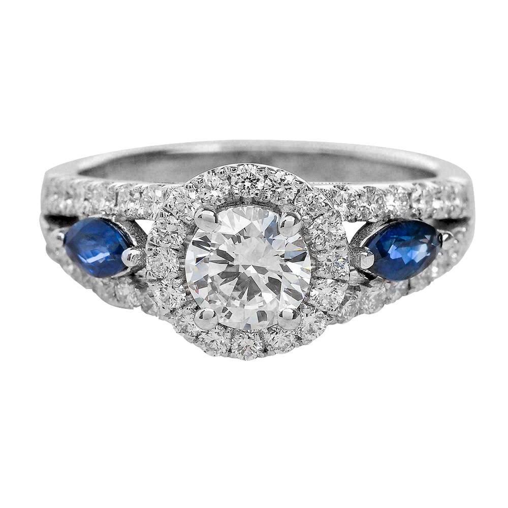 - Center Stone: Round Cut Moissanite 0.50ct
- Side Stones: Round Cut Diamonds 0.60ctw, Graded G SI1 / Oval Cut Blue Sapphires 0.25ctw, Graded AAA (VS)
- Metal: 14K White Gold

This piece is made-to-order. Please allow up to 7 Business Days to